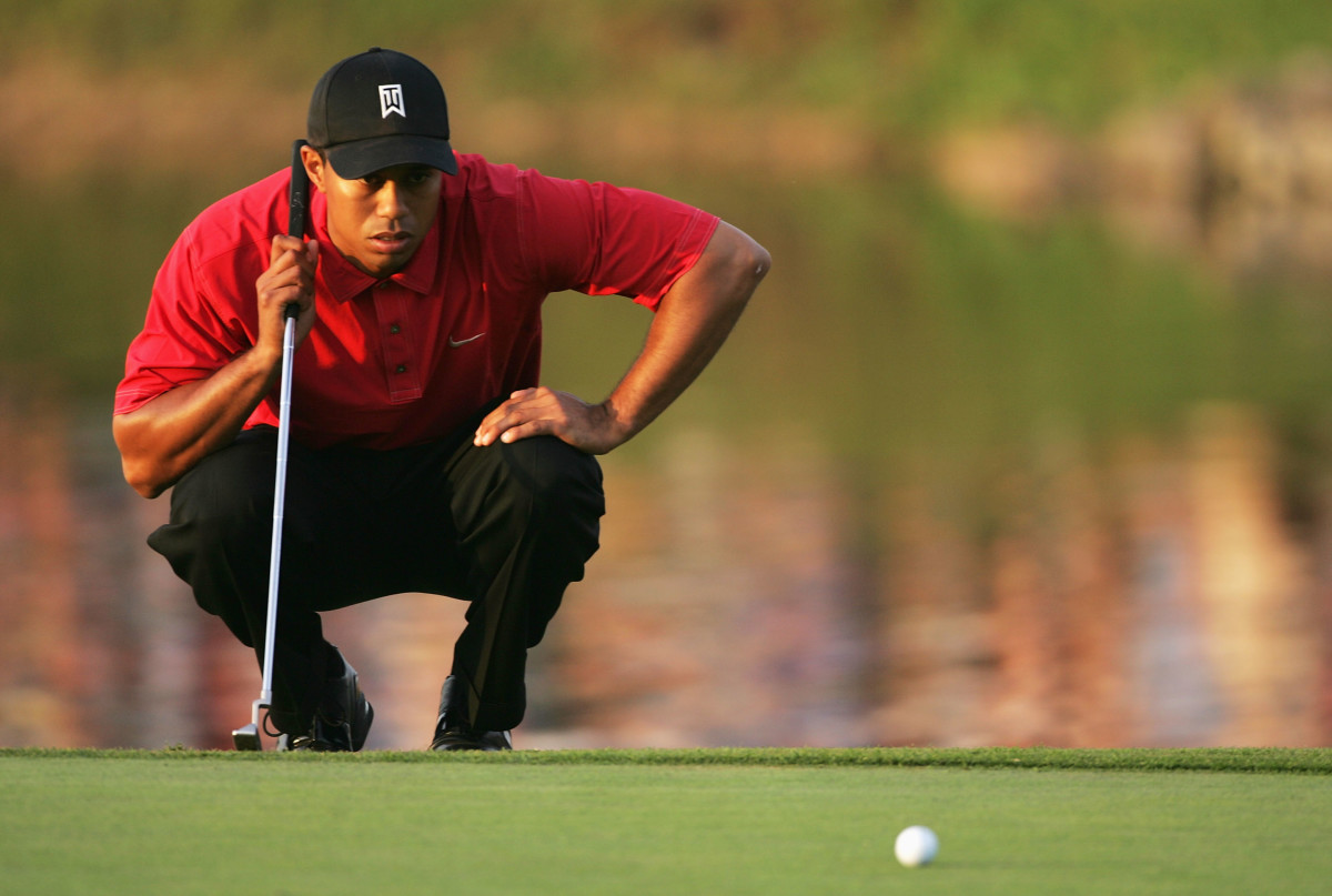 Tiger Woods lines up the winning putt at Doral in 2005. The Titleist Scotty Cameron putter Woods used to win 14 of his 15 majors is estimated to be worth as much as $30 million.