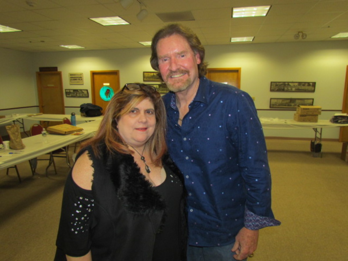 Marketing agent Mollie Bracigliano with client and baseball Hall of Famer Wade Boggs.