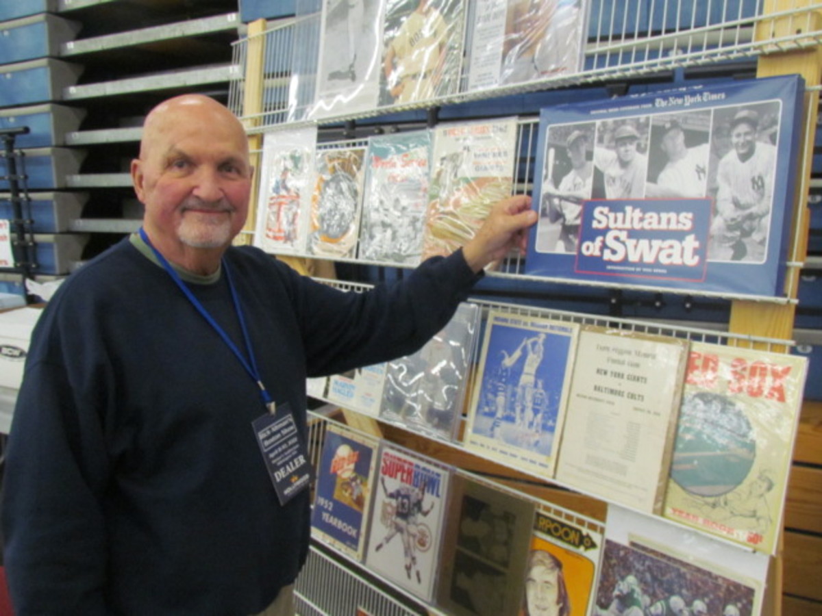 Ted Murray of Vintage Sports Publications, sets up at Rich Altman's Boston Show.