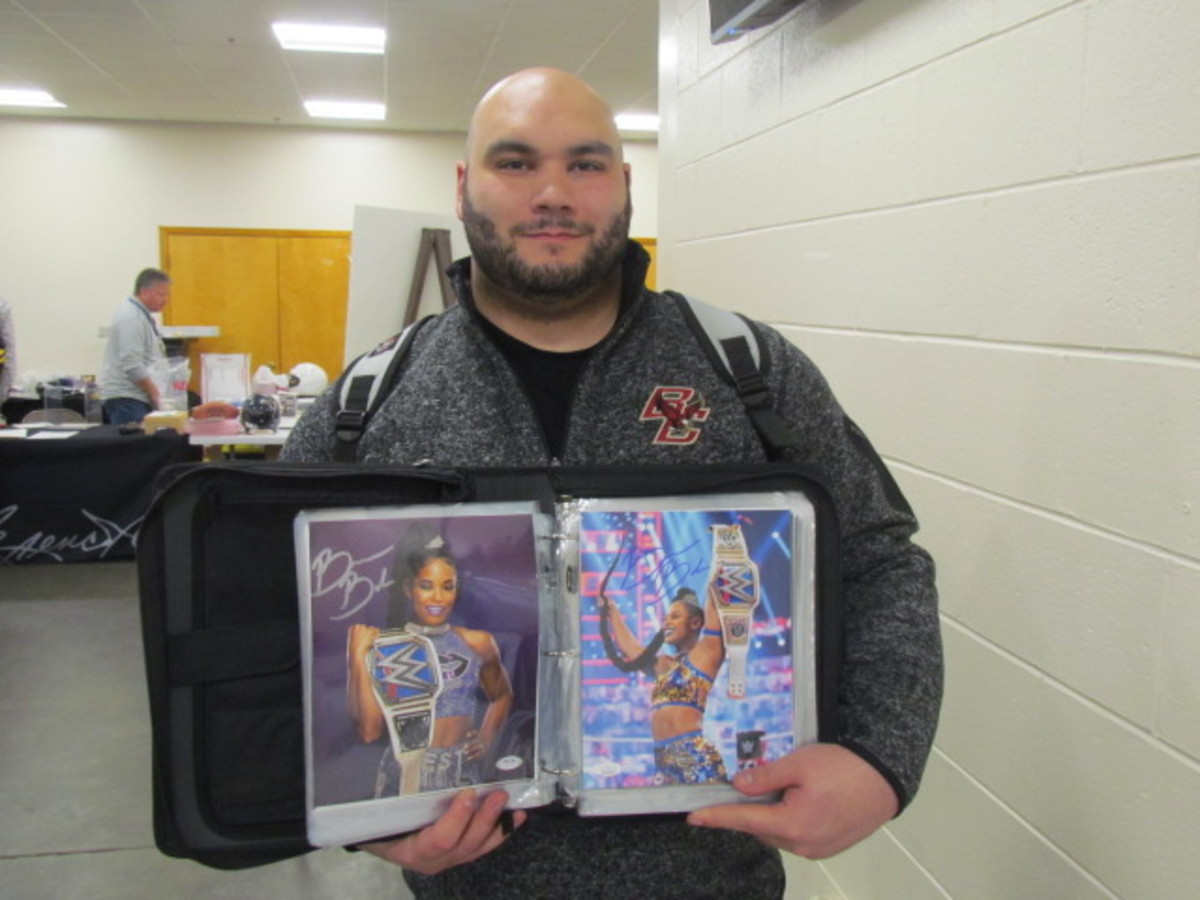 Collector John Fortes shows off his wrestling autograph collection at Rich Altman's Boston Show.