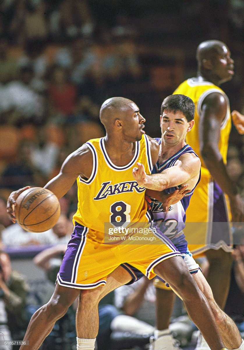Kobe Bryant is guarded by John Stockton during the 1996-97 NBA playoffs.
