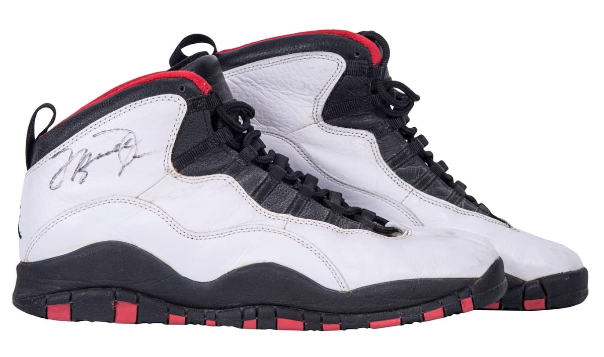 A pair of 1995 Jordan double-signed Nike Air Jordan Sneakers.