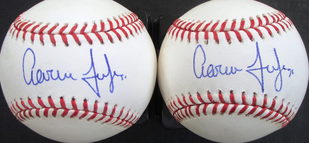 Baseballs signed by Aaron Judge.
