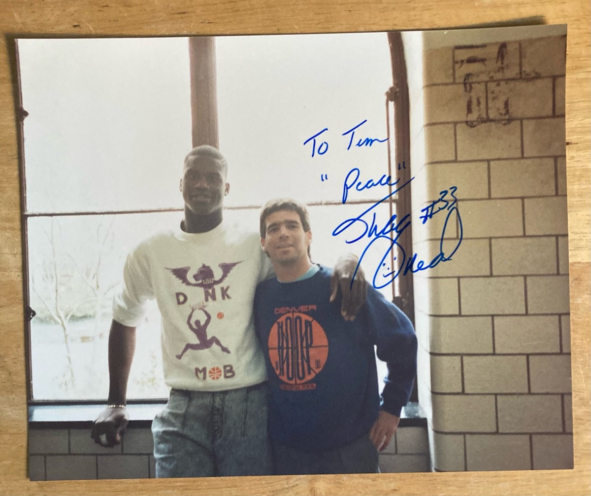 Tim Gallagher gets a photo and autograph from a young Shaquille O'Neal in 1991.