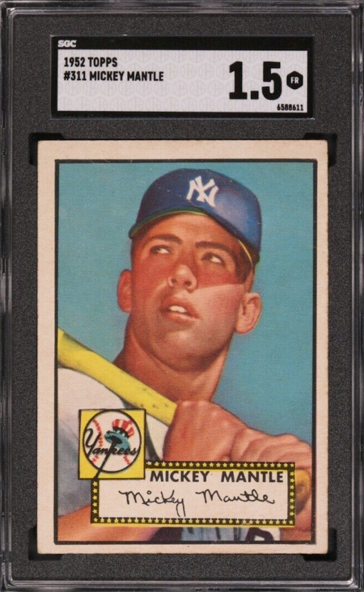 A 1952 Topps Mickey Mantle, graded SGC 1.5.