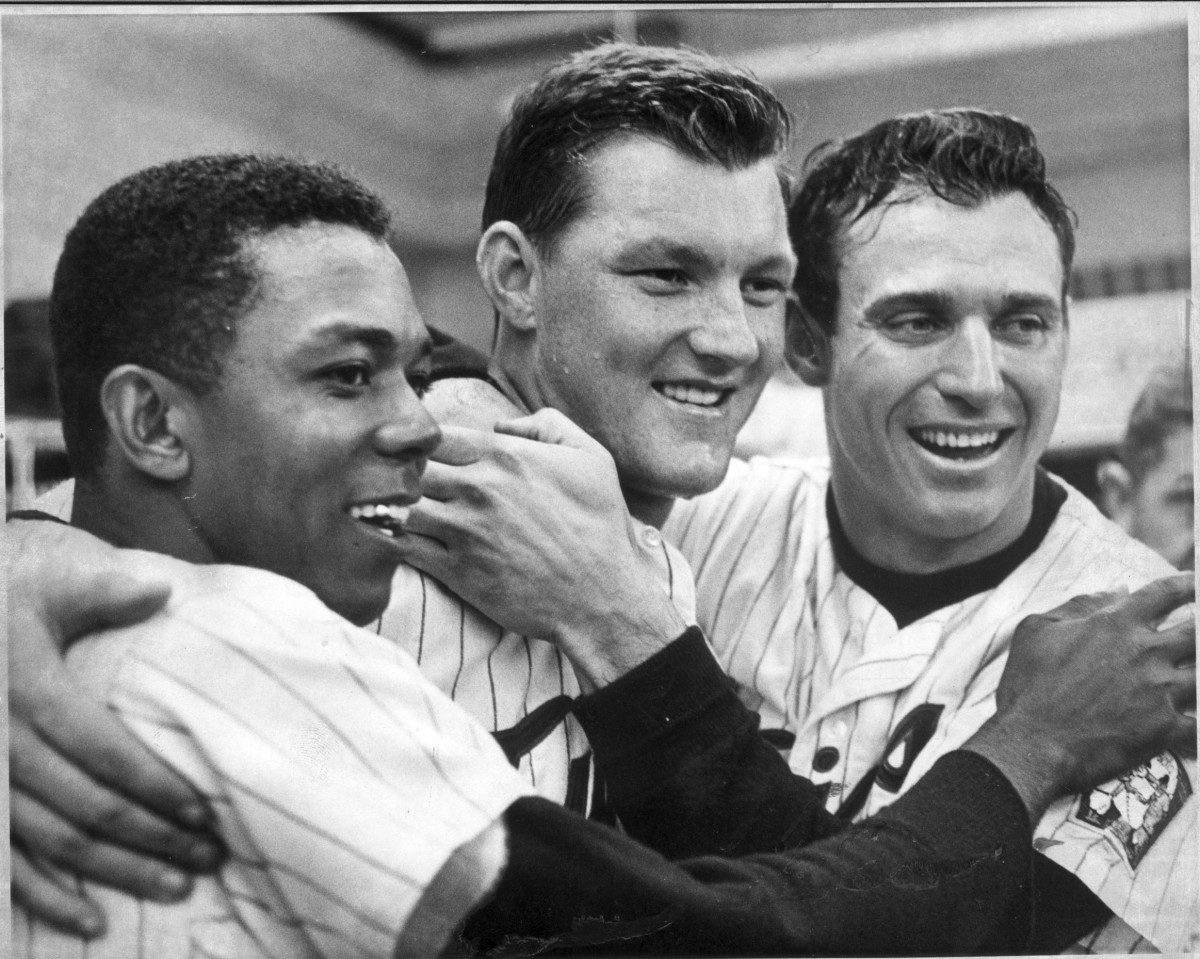 (From left) Twins stars Tony Oliva, Jim Kaat and Bob Allison celebrate a win for the Minnesota Twins in the 1965 World Series.