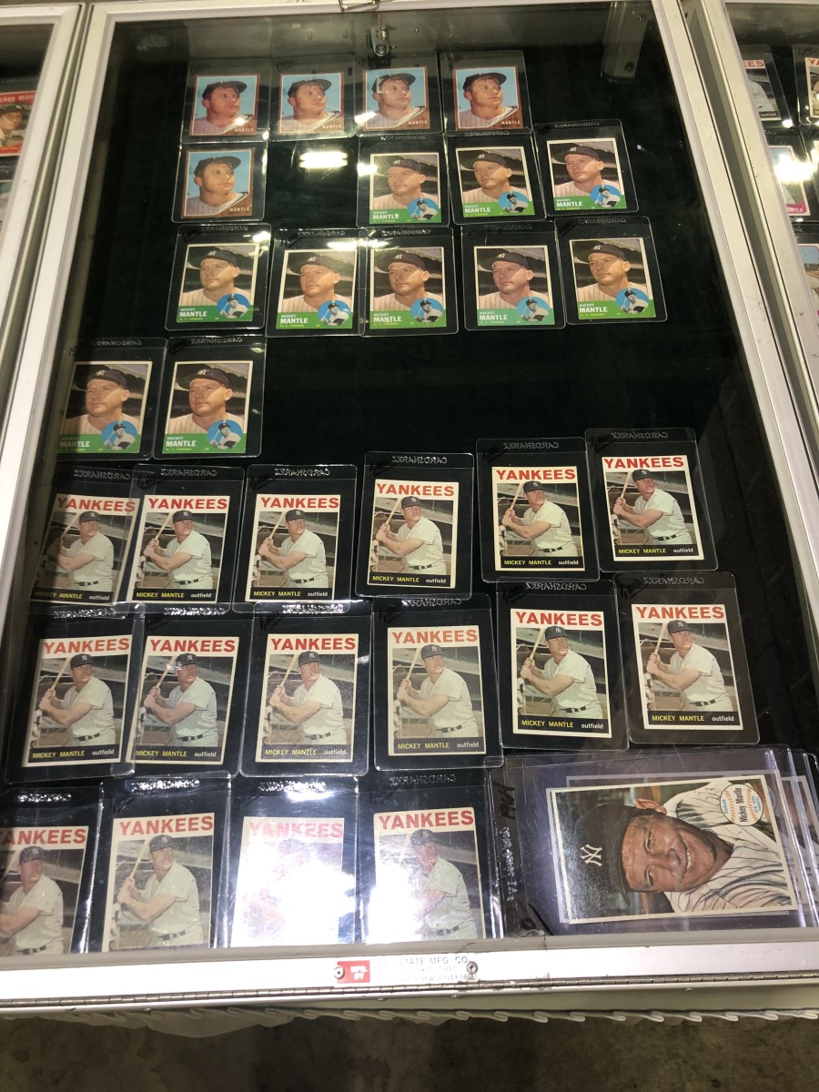 A card case at Gizmo's Sportscards shows Mickey Mantle cards missing following an alleged theft at the National Sports Collectors Convention.