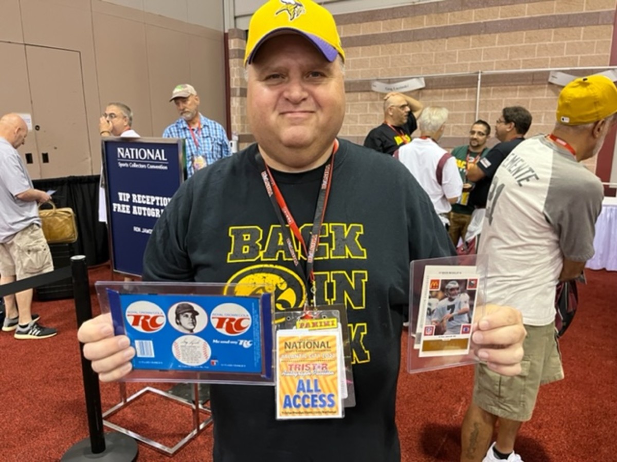Ron Lashmit with a flattened RC Cola can featuring Greg Luzinski and a McDonald's card signed by Ron Jaworski.