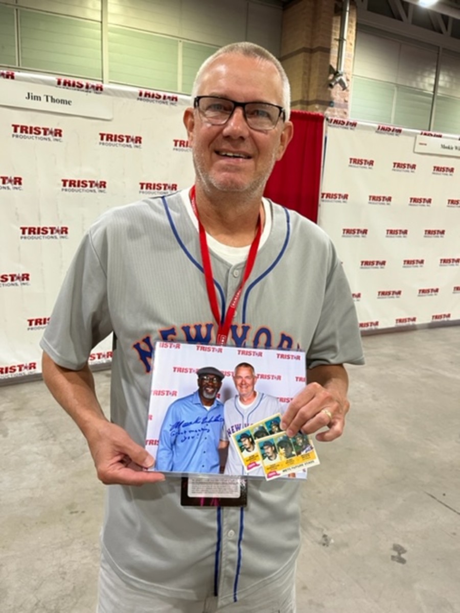 Collector and New York Mets fan Scott Naeker with his collection of autographs from former Mets star Mookie Wilson.
