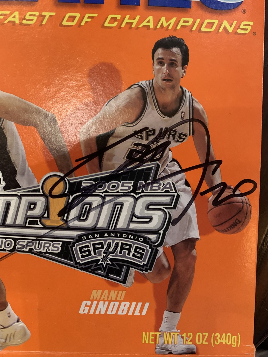 A Wheaties box signed by Manu Ginobili at the 2022 Basketball Hall of Fame induction ceremonies.