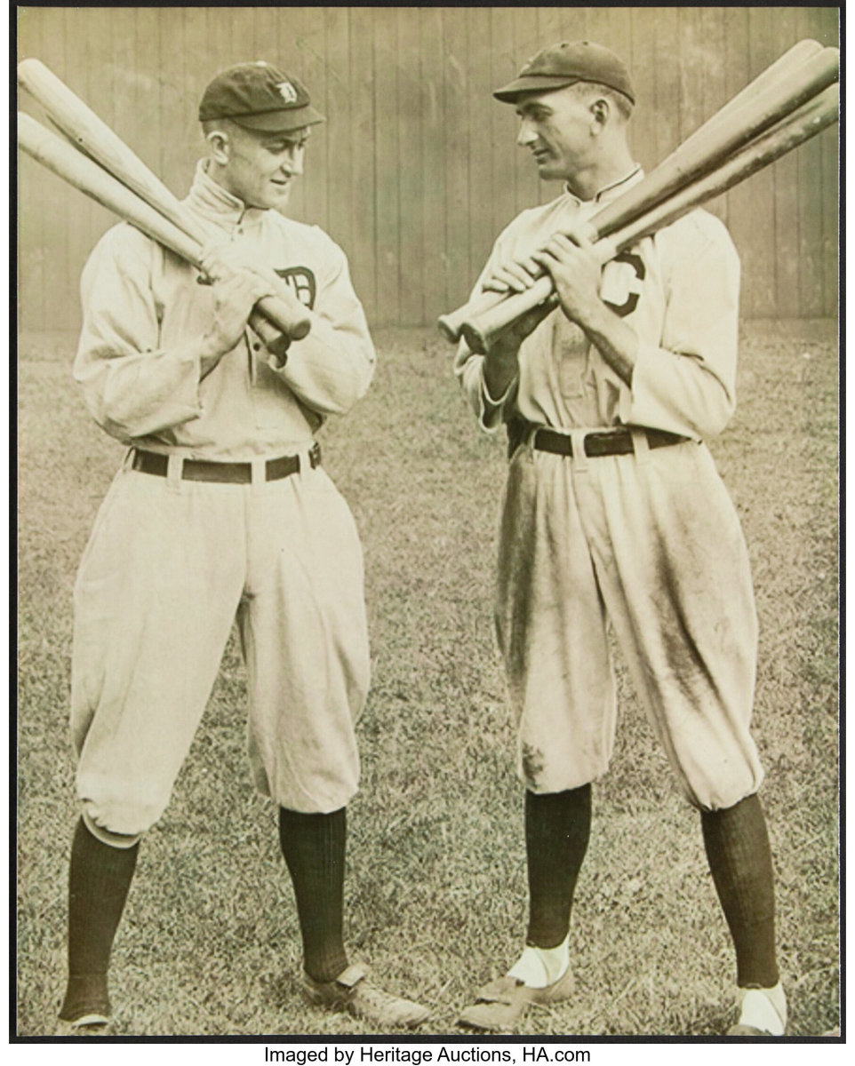 Photo of Ty Cobb (left) and Shoeless Joe Jackson holding their bats. One of Cobb's bats from 1910-14 is up for bid at Heritage Auctions.