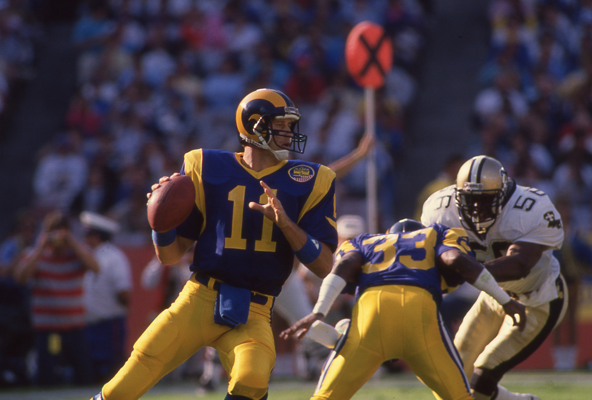 Jim Everett of the Los Angeles Rams drops back to pass against the New Orleans Saints at Anahiem Stadium circa 1987.