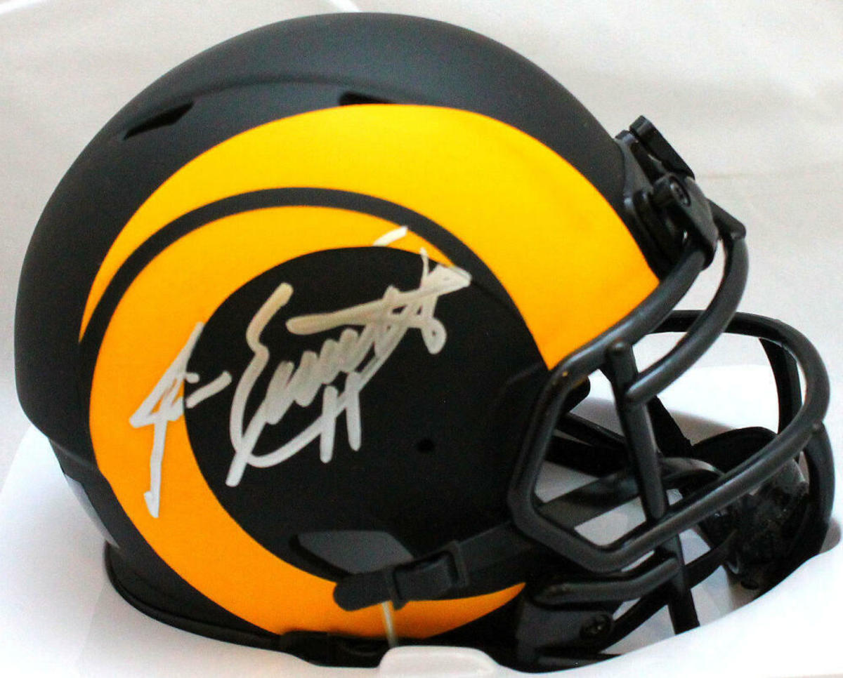 A Jim Everett autographed Rams helmet.