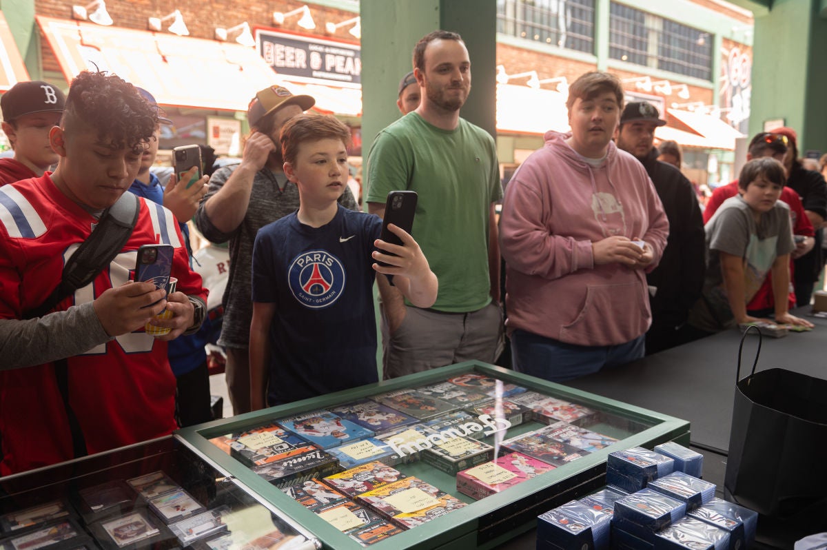 Collectors check out the cards at the Fenway Card Show at Fenway Park in Boston. 
