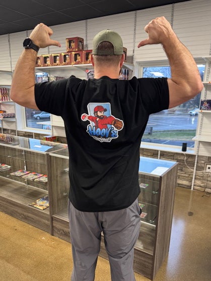 Former MLB pitcher J.J. Hoover shows off his logo and T-shirt at Hoov's Hangout. 