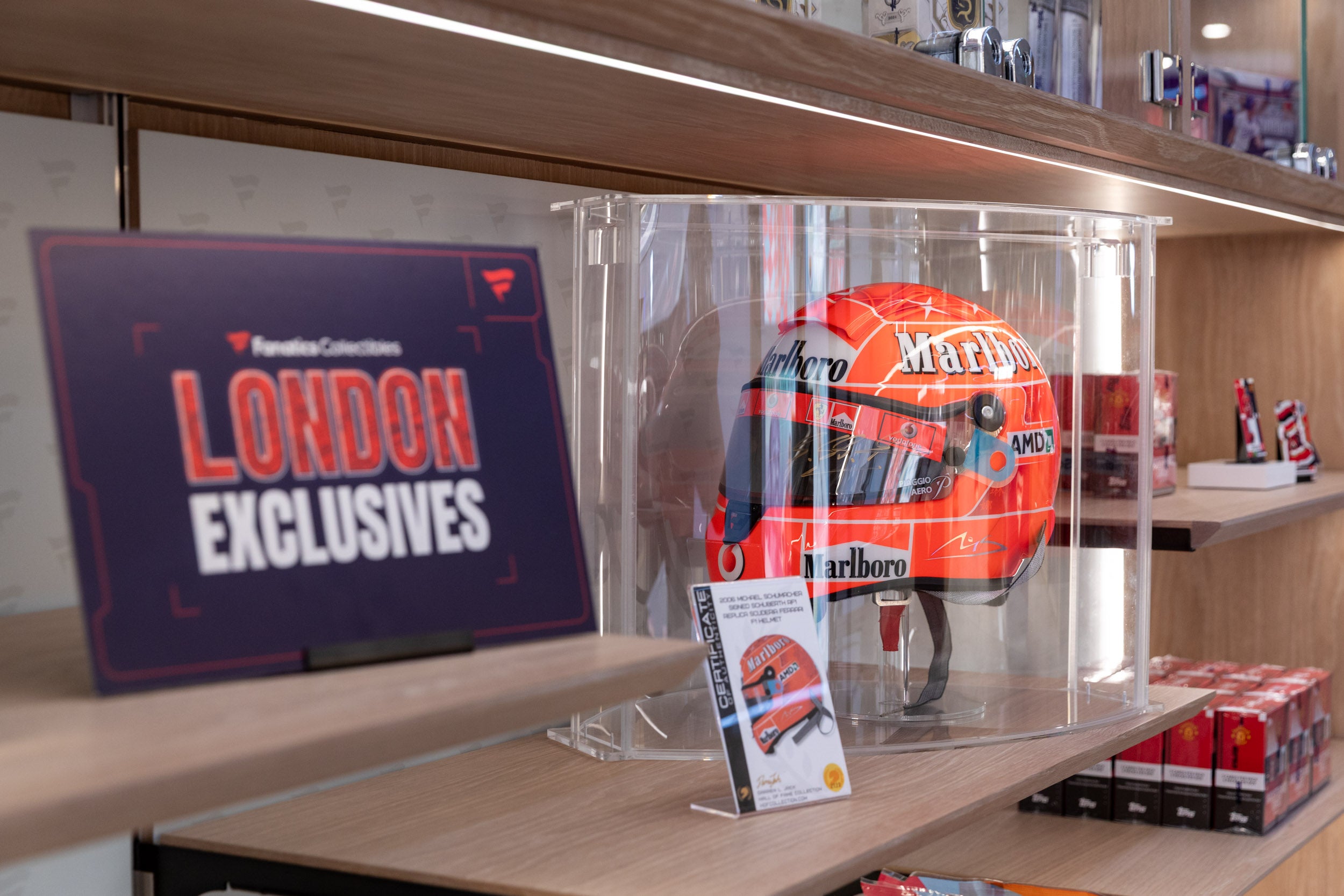 An F1 helmet and cards at the Fanatics Collectibles store in London. 