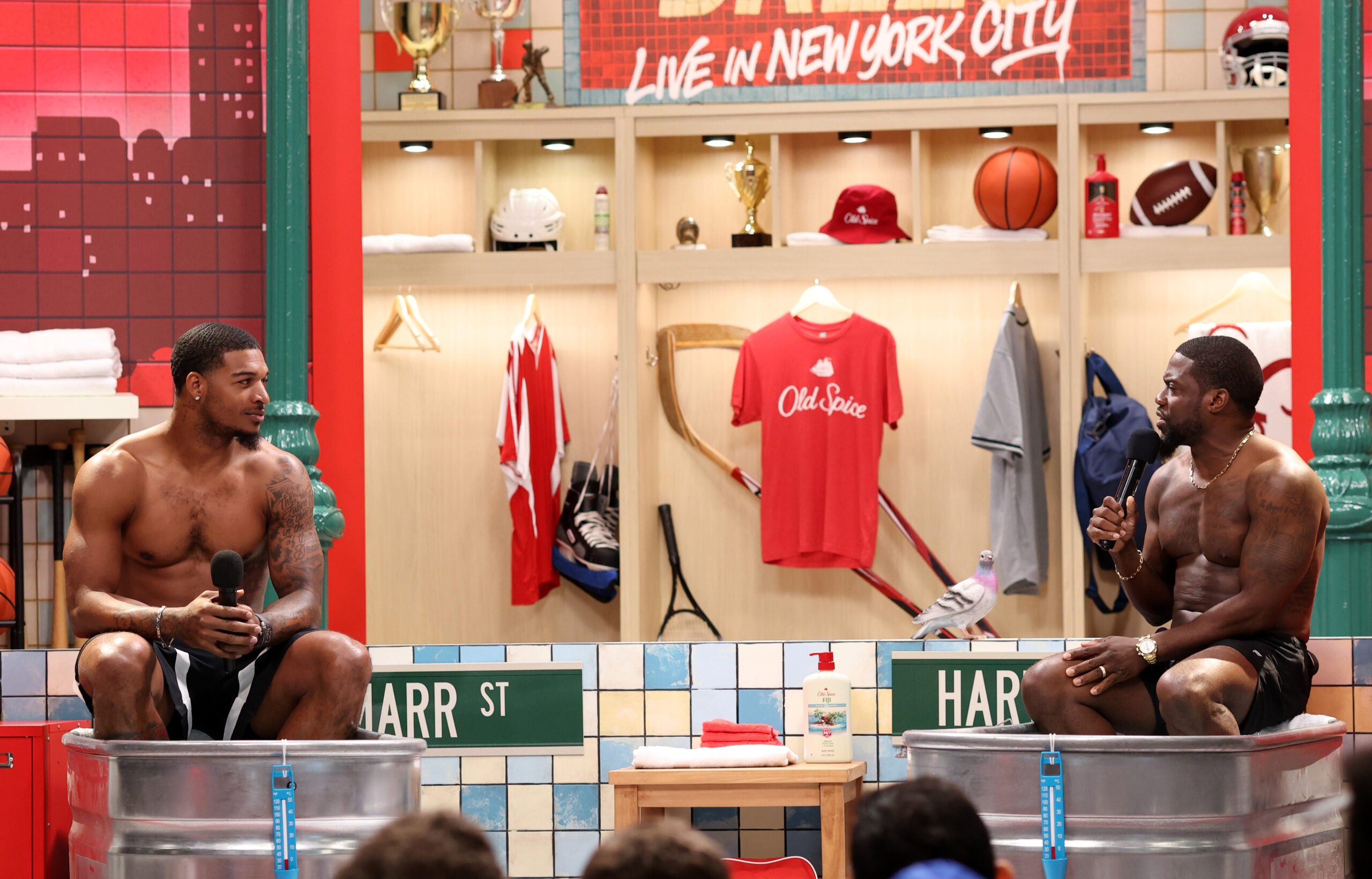 NFL WR Ja'Marr Chase and comedian Kevin Hart take cold baths at Fanatics Fest NYC. 