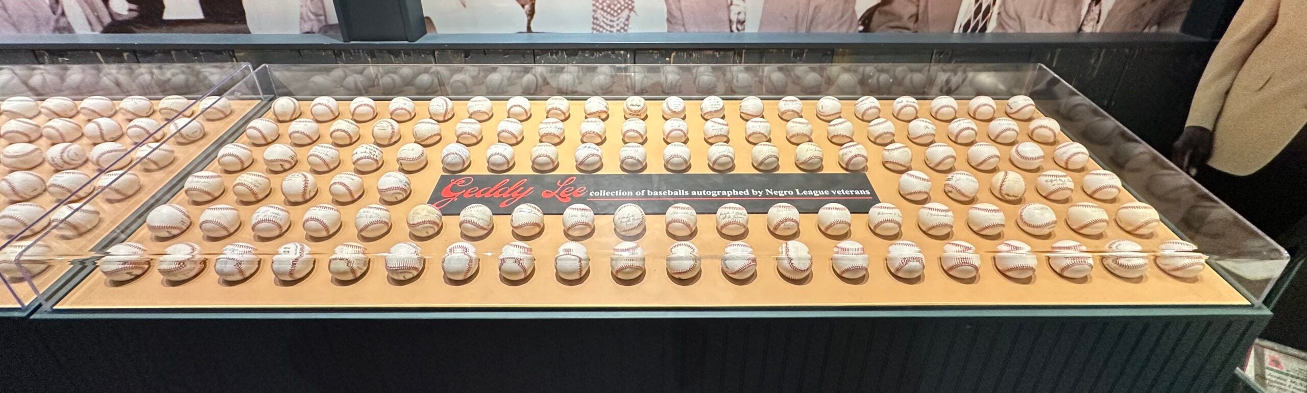 Signed baseballs from Negro League stars from the Geddy Lee Collection. 