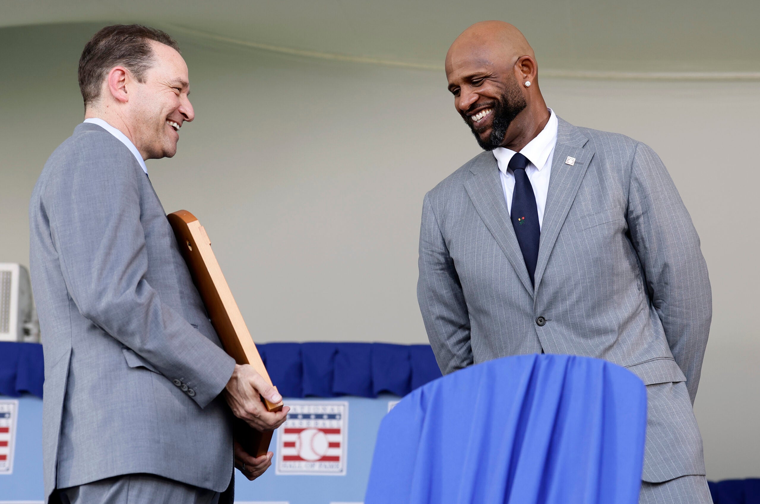 CC Sabathia accepts his plaque from Hall of Fame President Josh Rawitch. 