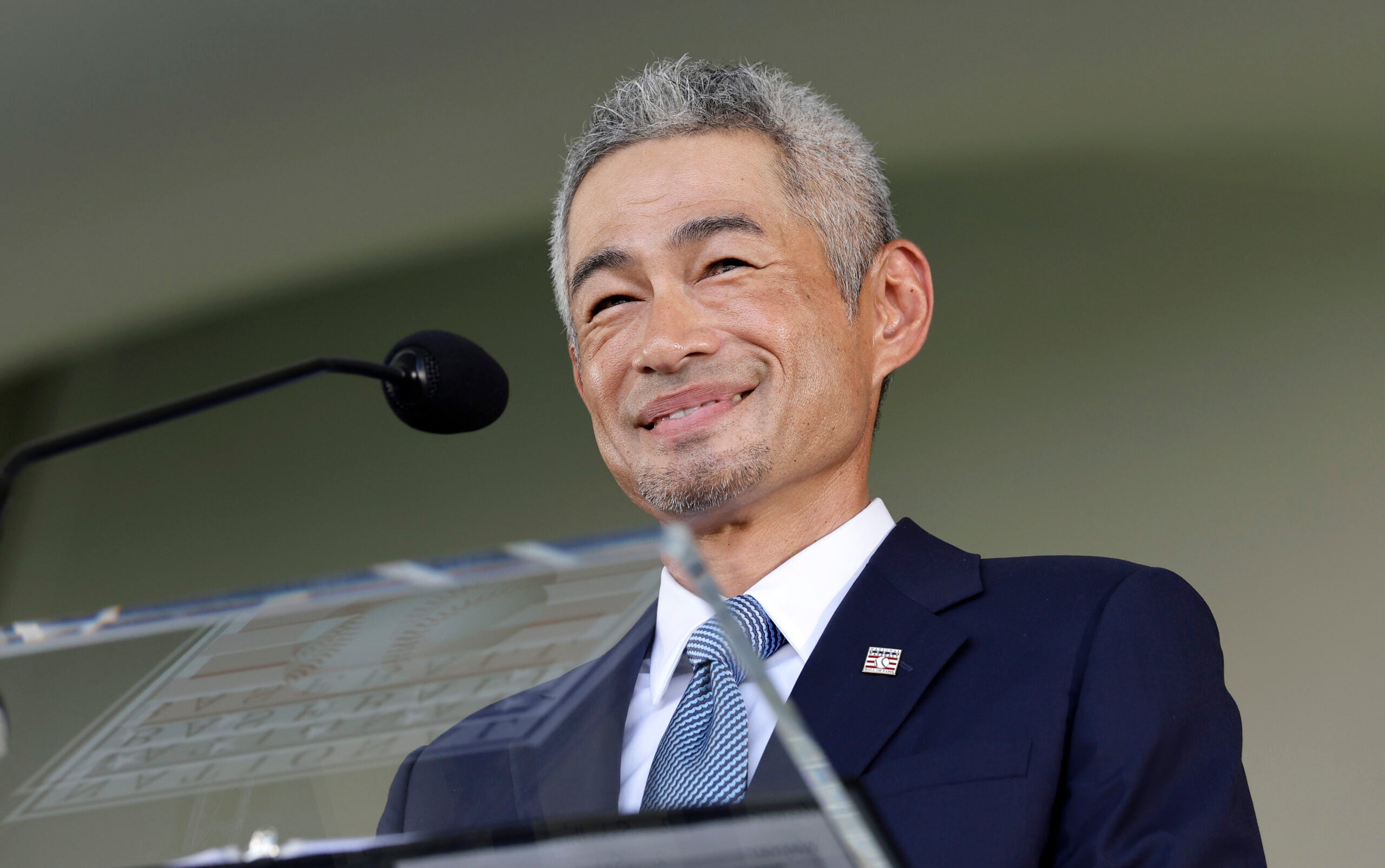 Ichiro Suzuki speaks during his Baseball Hall of Fame induction ceremony July 27 in Cooperstown.