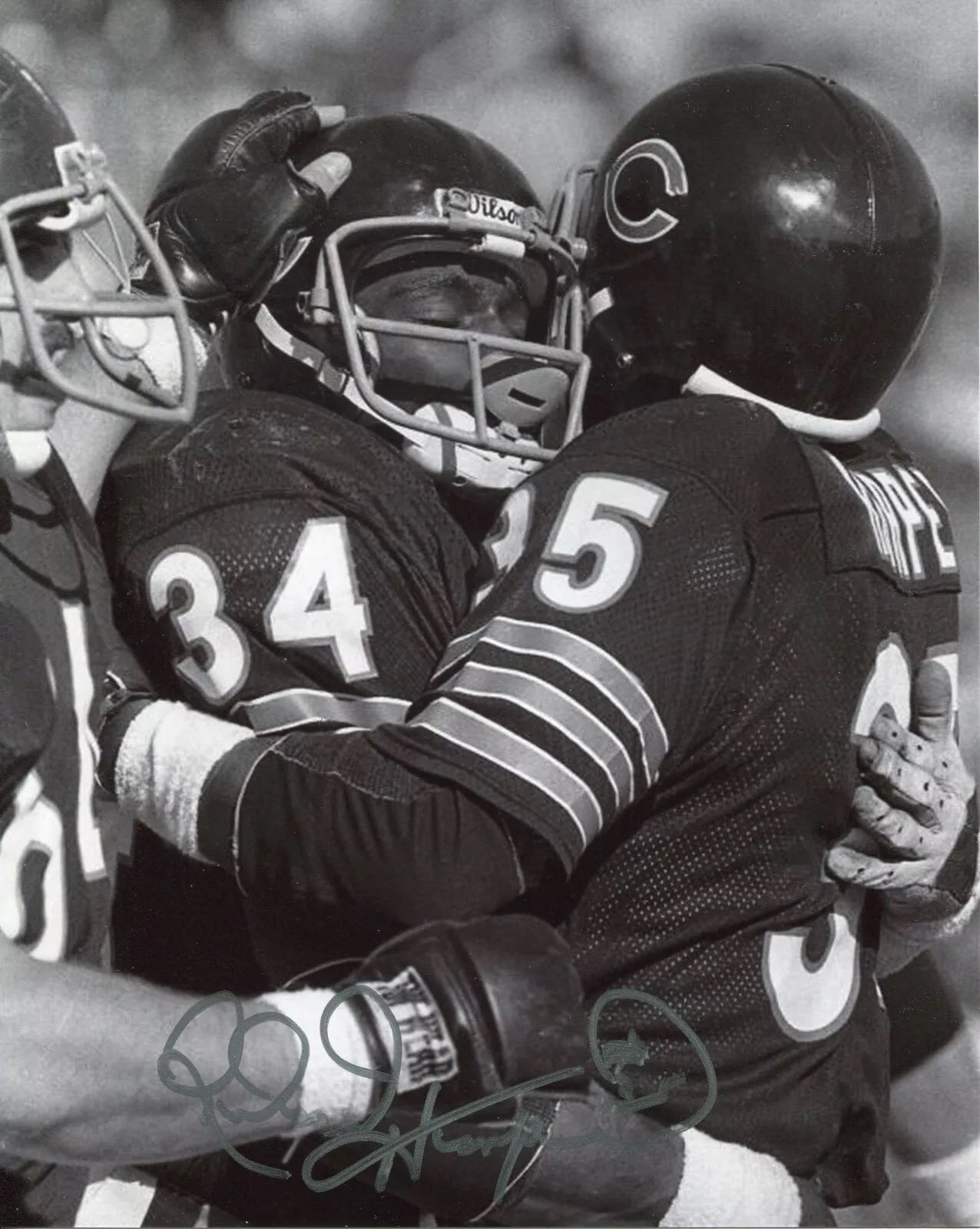 A signed photo of Chicago Bears RBs Walter Payton and Roland Harper. 