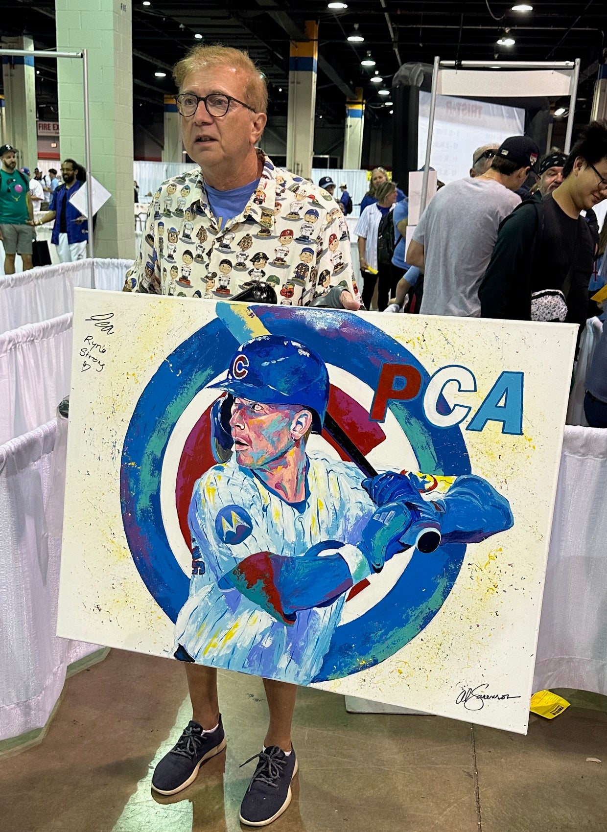 Rick Heinz, president of Illinois-based Scoreboard Charities, had Pete Crow-Armstrong sign a special piece of art for charity. 