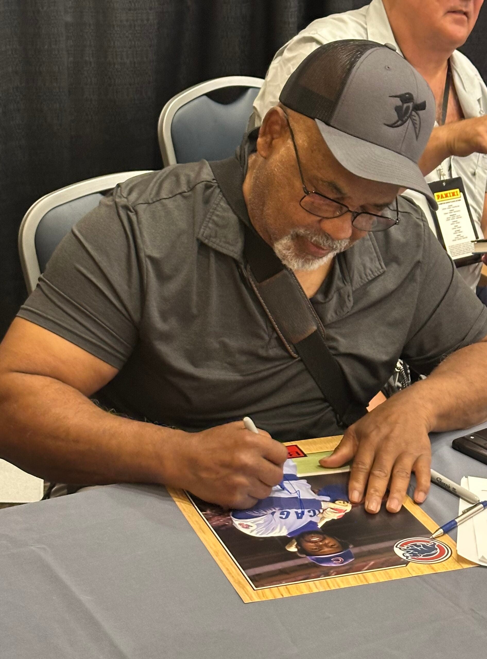 Baseball legend Al Oliver signs autographs at The National. 