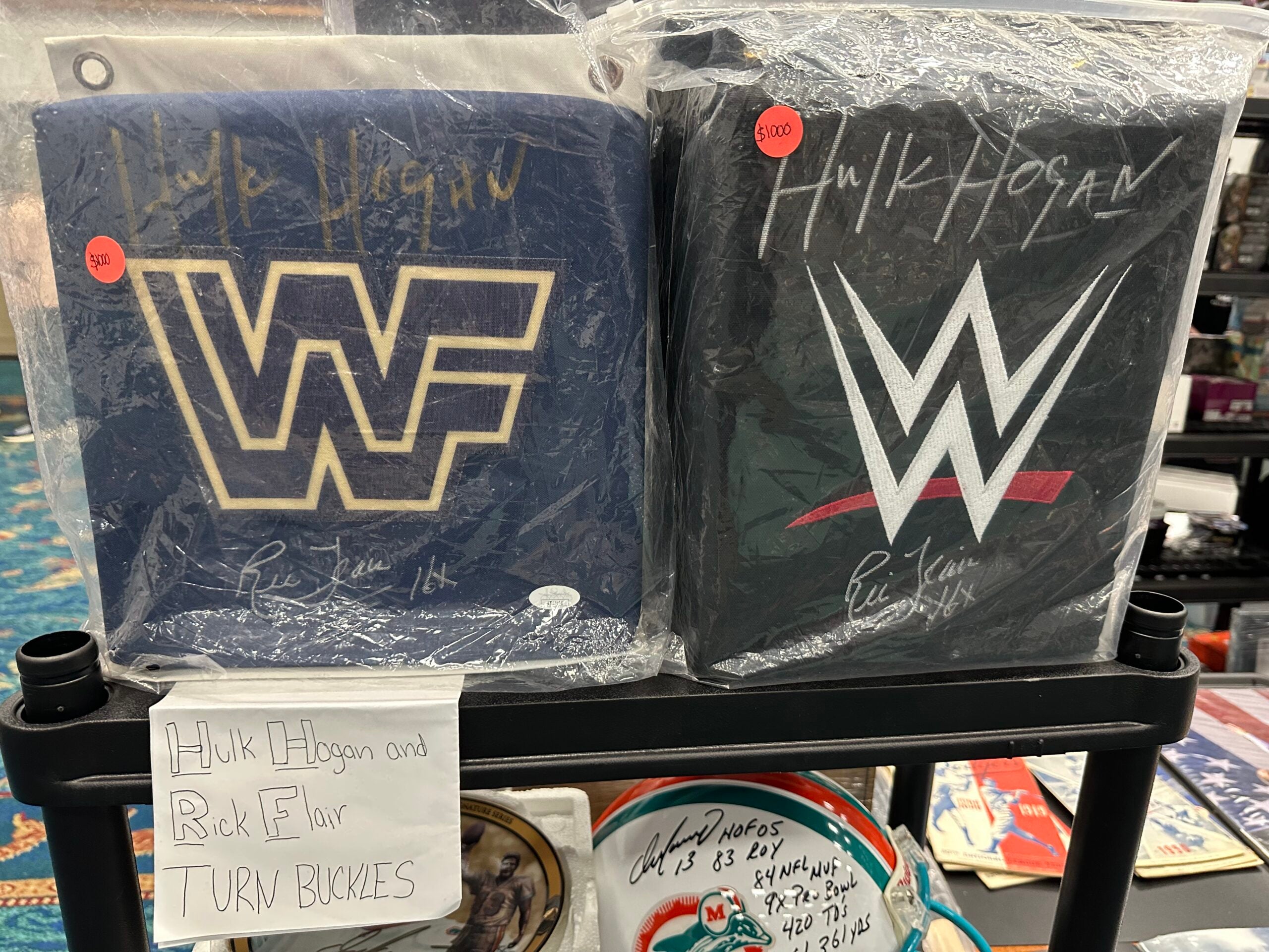 Hulk Hogan and Ric Flair autographed turnbuckles. 
