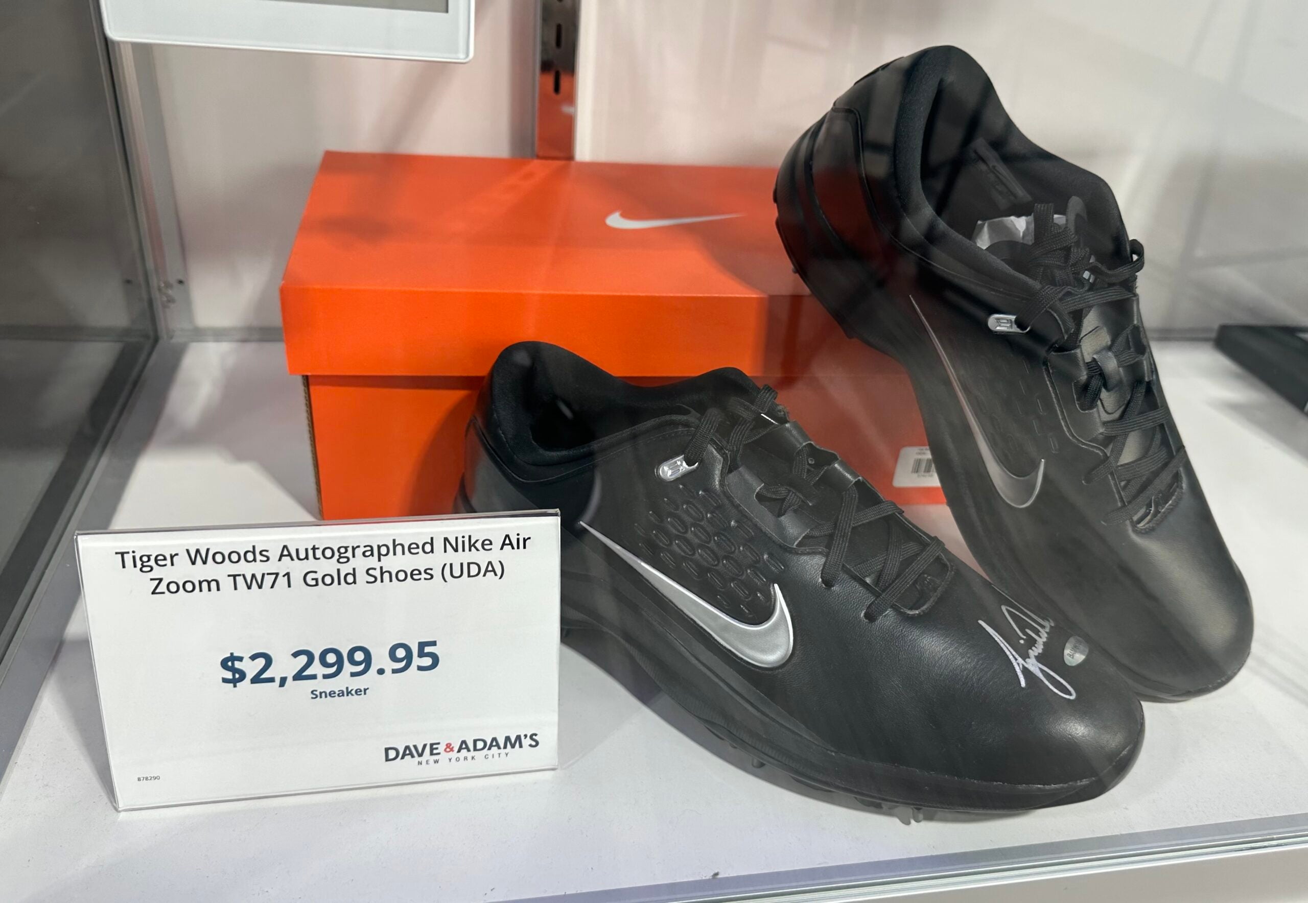 Tiger Woods-signed golf shoes at Dave & Adam's New York City store. 
