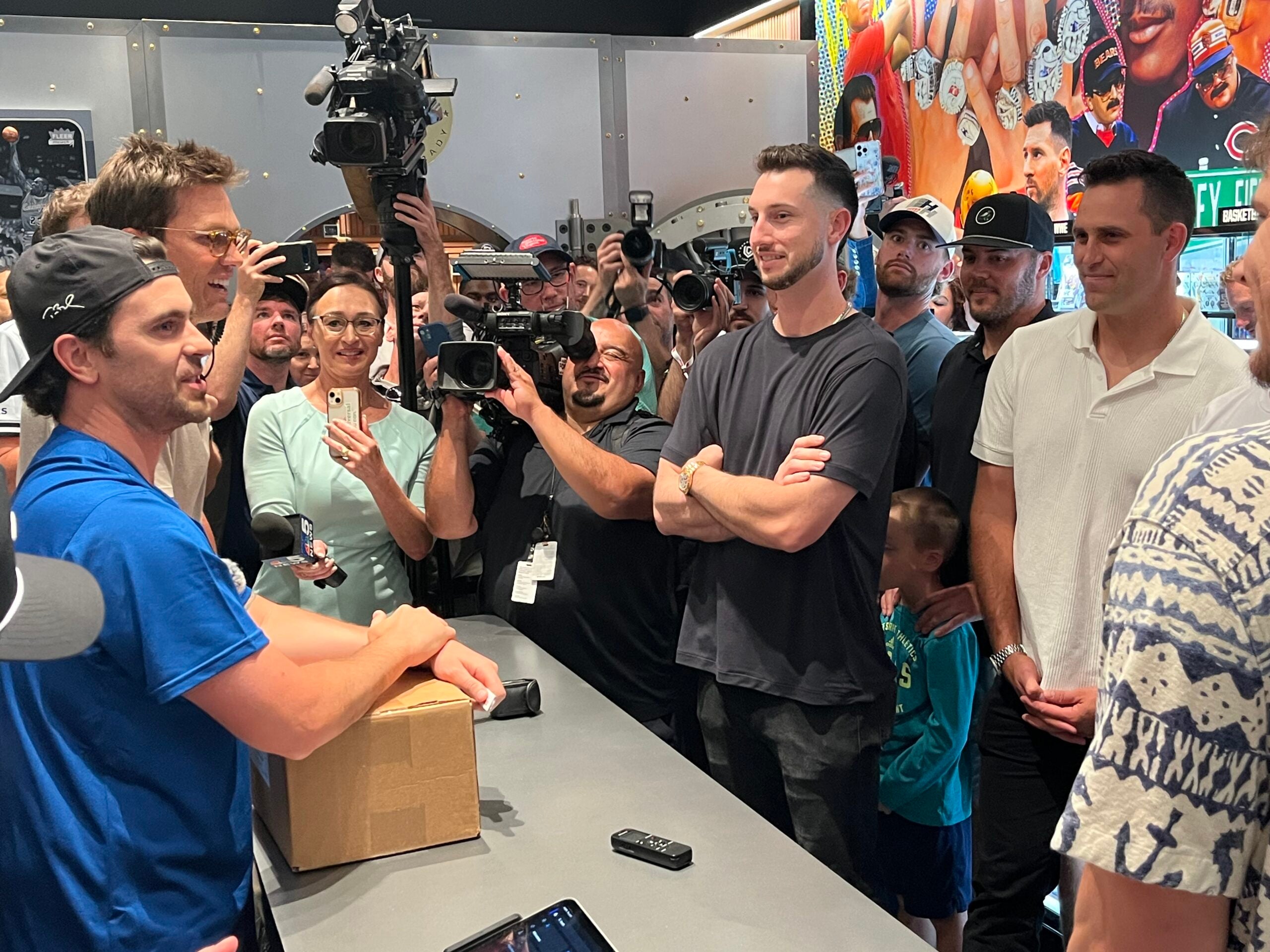 Cubs star Kyle Tucker and other Cubs players at CardVault By Tom Brady in Chicago. 