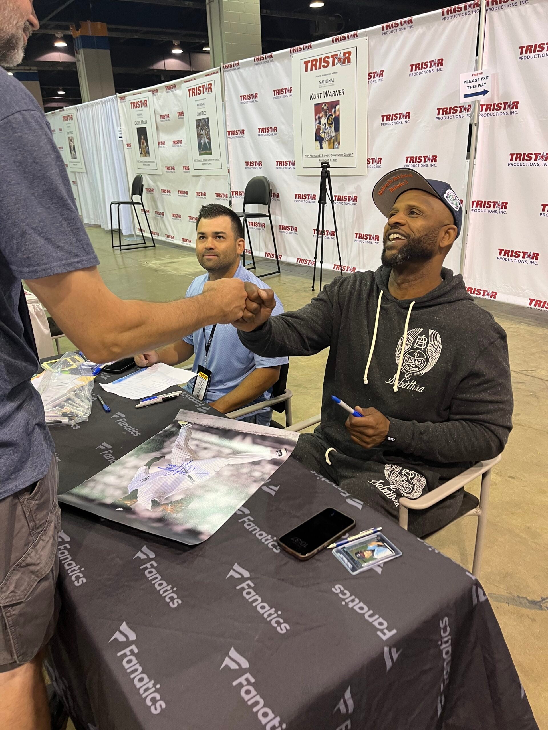 CC Sabathia signs autographs at The National. 