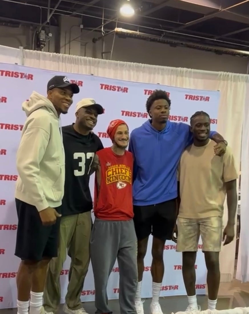 Giannis Antetokounmpo and brothers Alex, Kostas and Thanasis at The National.  

