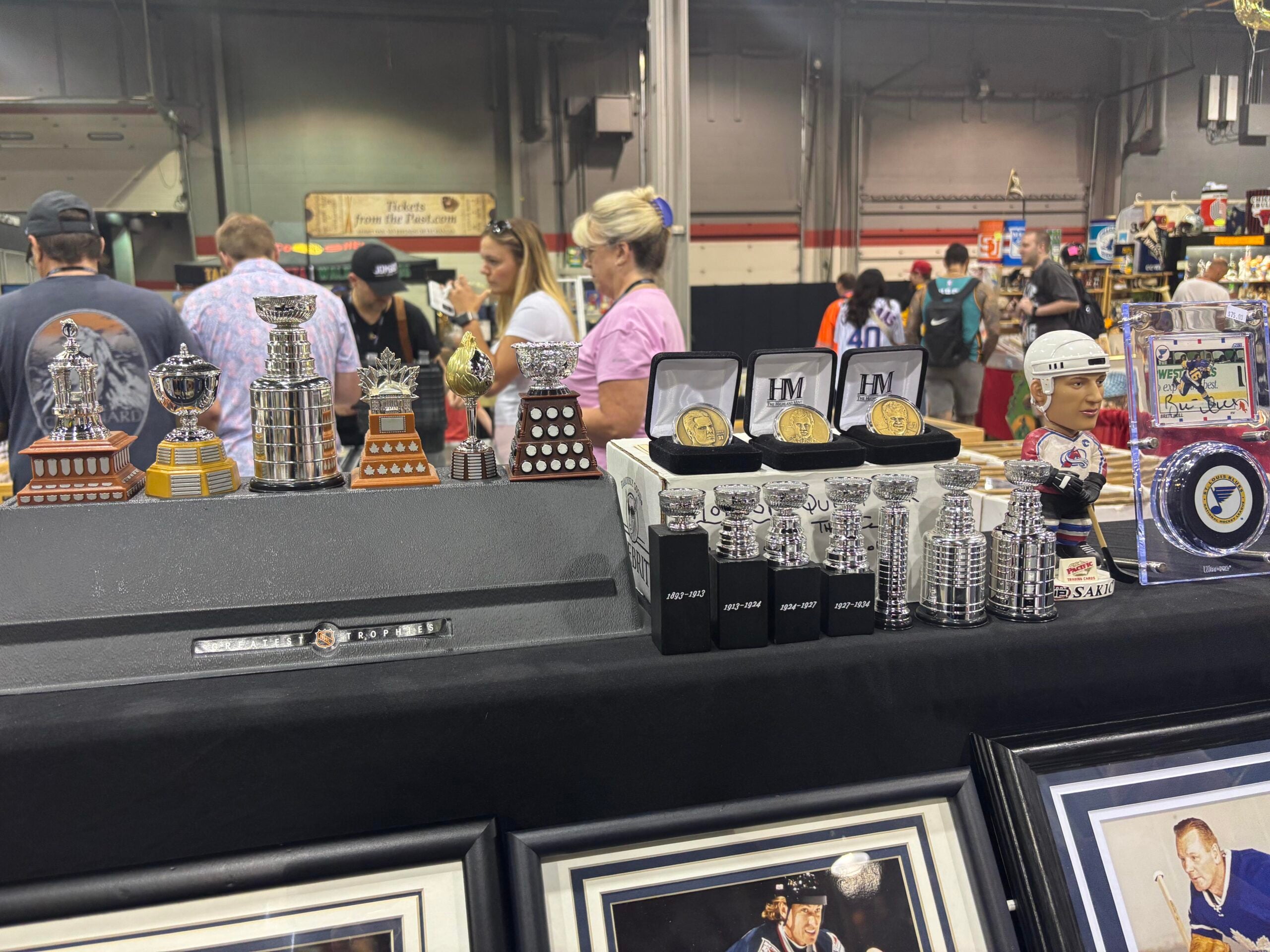 Miniature NHL trophies, including the Stanley Cup, were among the many rare collectables for sale at the NSCC in Chicago. 
