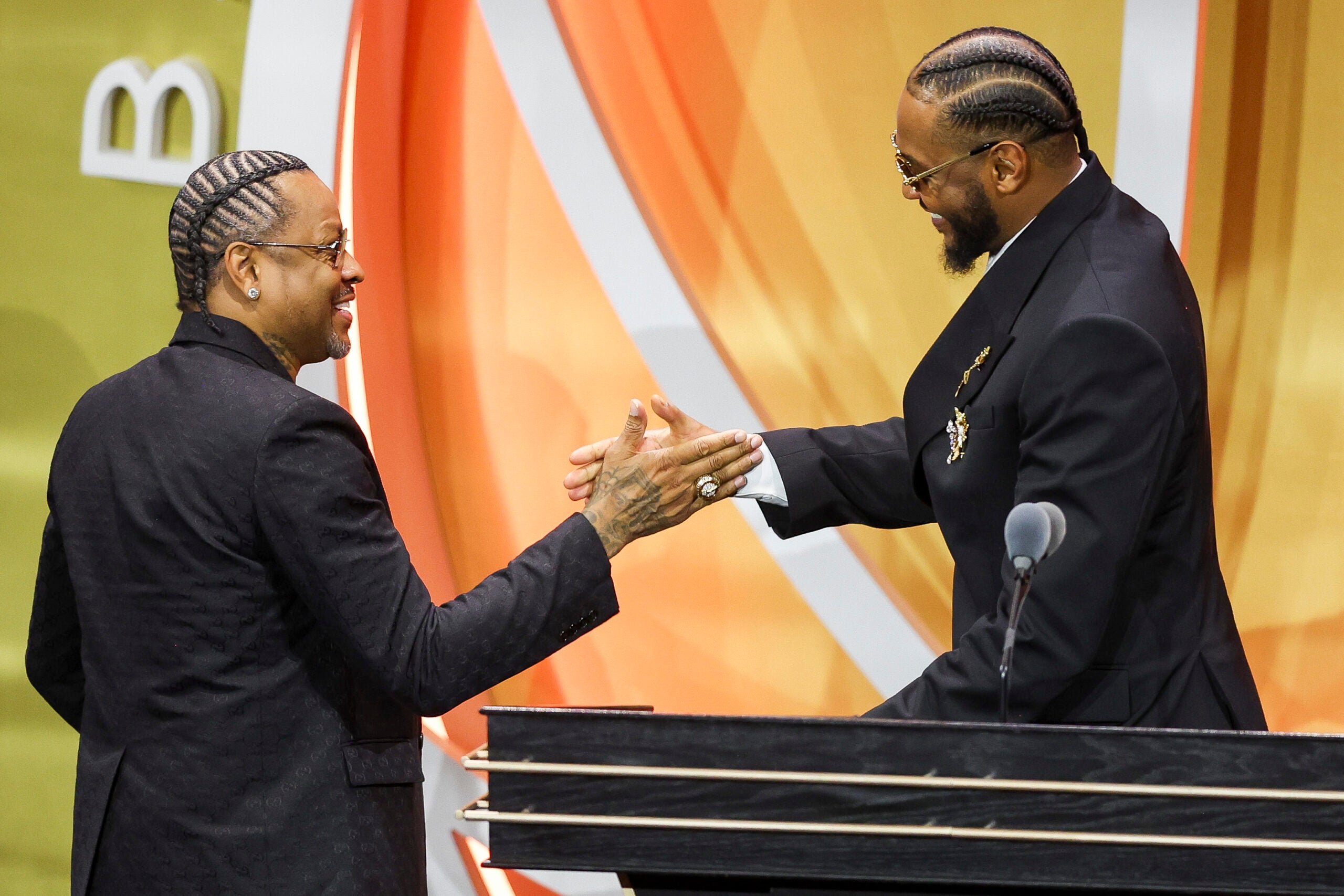 Carmelo Anthony is congratulated by Allen Iverson at the Basketball Hall of Fame inductions. 