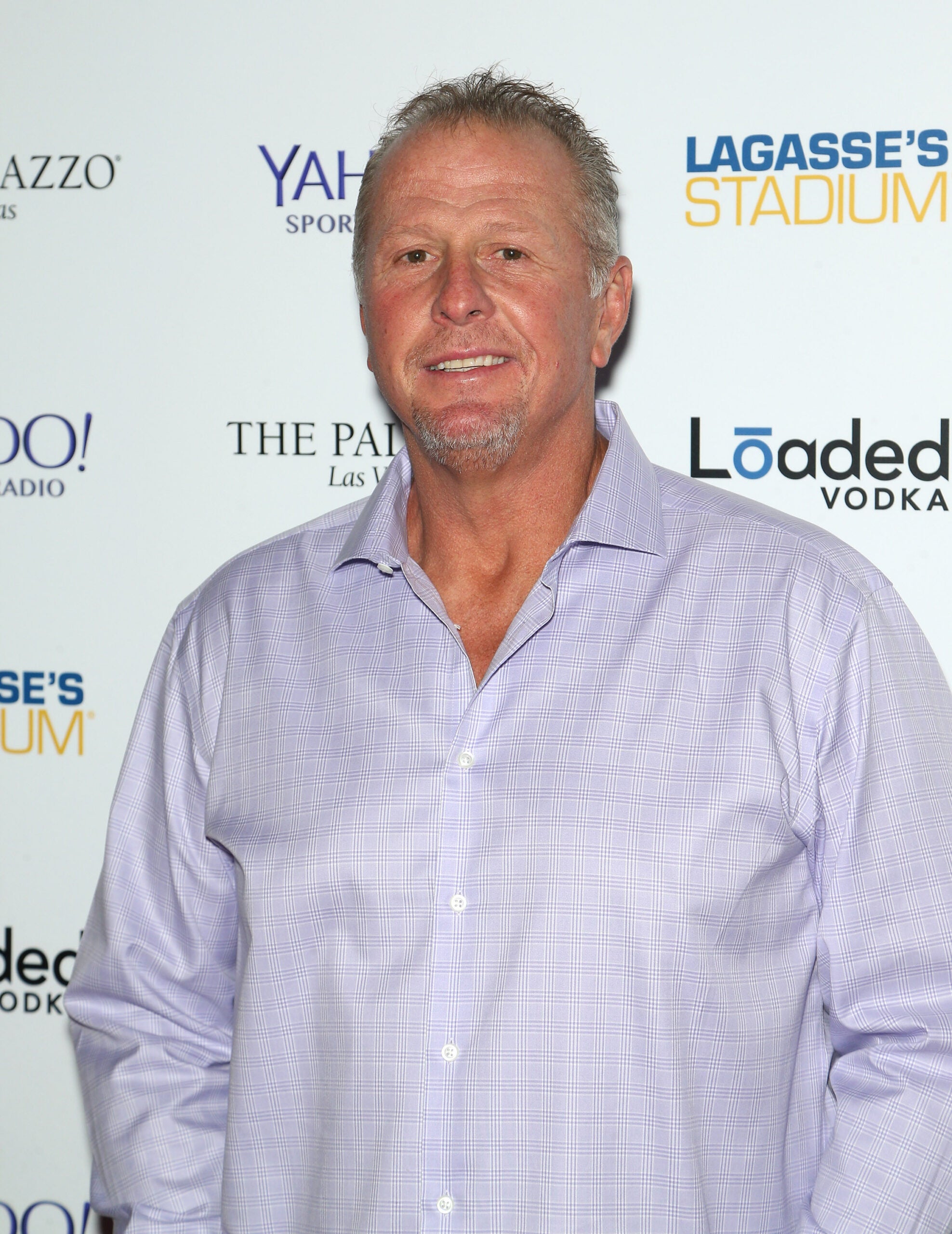 Salisbury, a popular media personality, with Yahoo! Sports Radio at the grand opening of The Palazzo Broadcast Studio in 2015 at Lagasse's Stadium in Las Vegas.