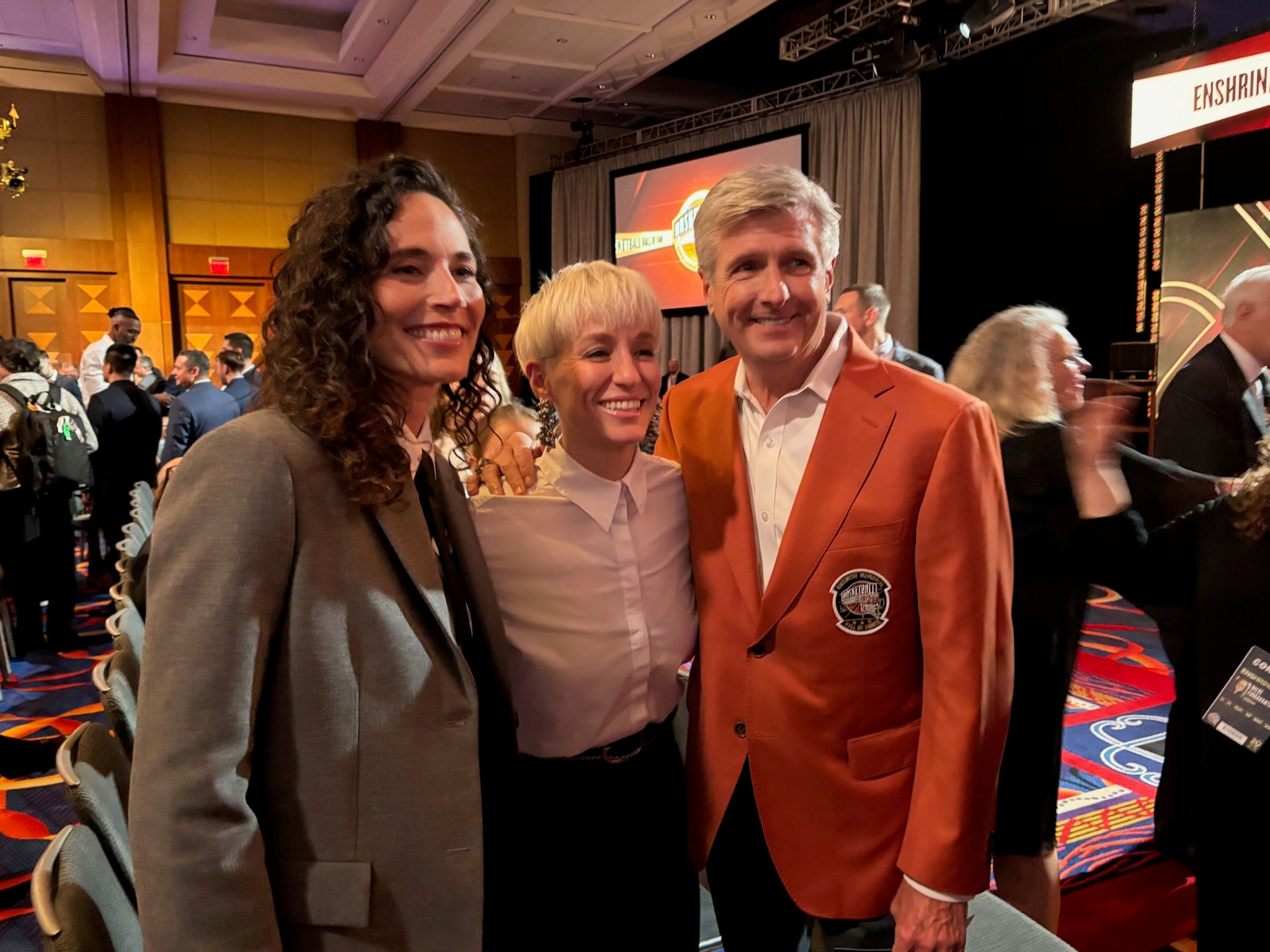 Sue Bird with soccer star Megan Rapinoe and Basketball Hall of Famer David Hixon. 