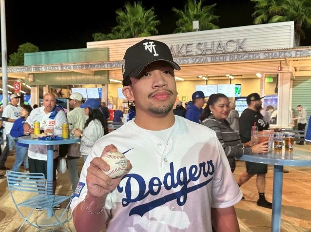Carlo Mendoza, who retrieved Shohei Ohtani's historic home run at Dodger Stadium. 