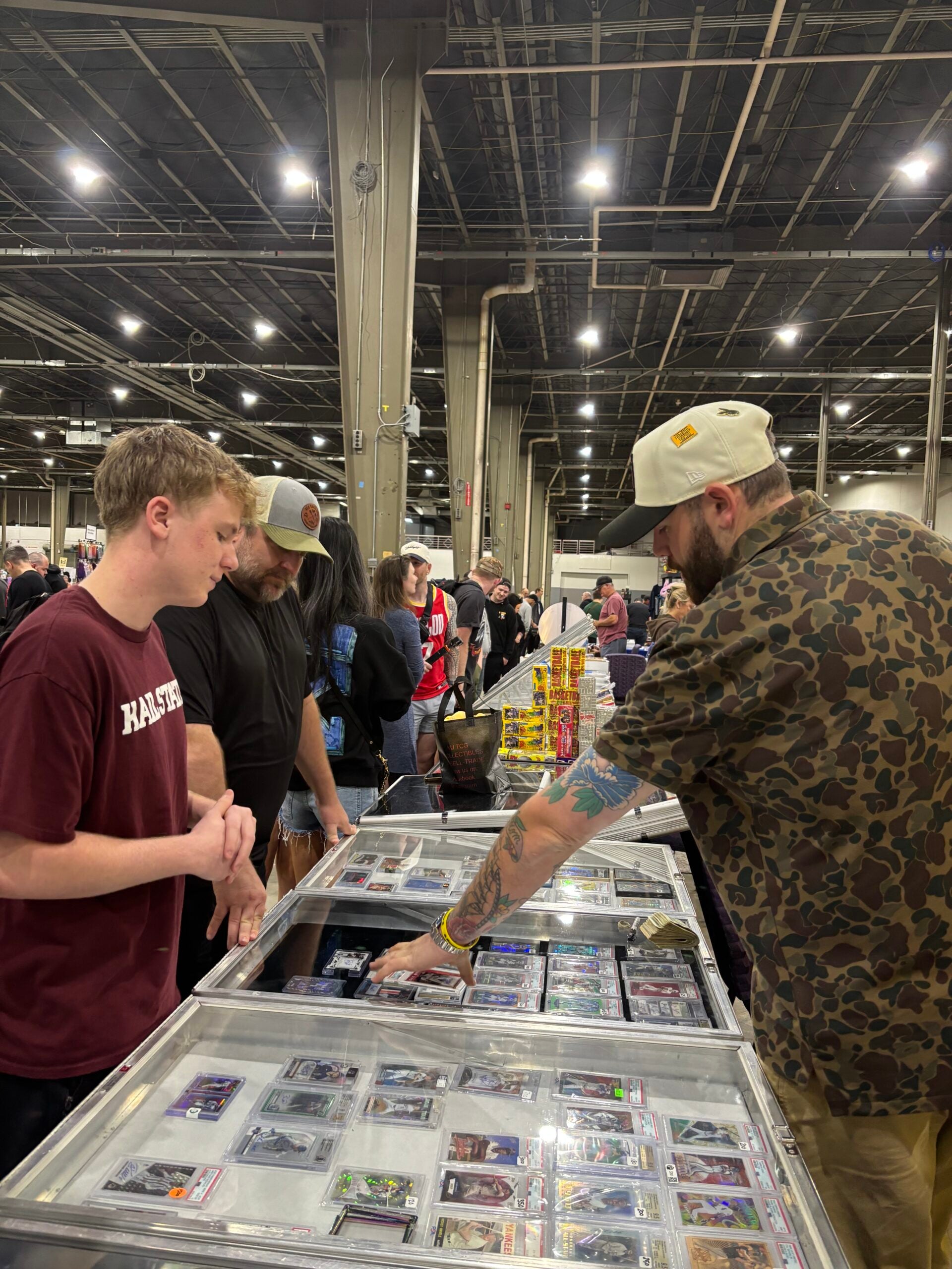 Collectors shop for cards at the Charlotte Card Show. 