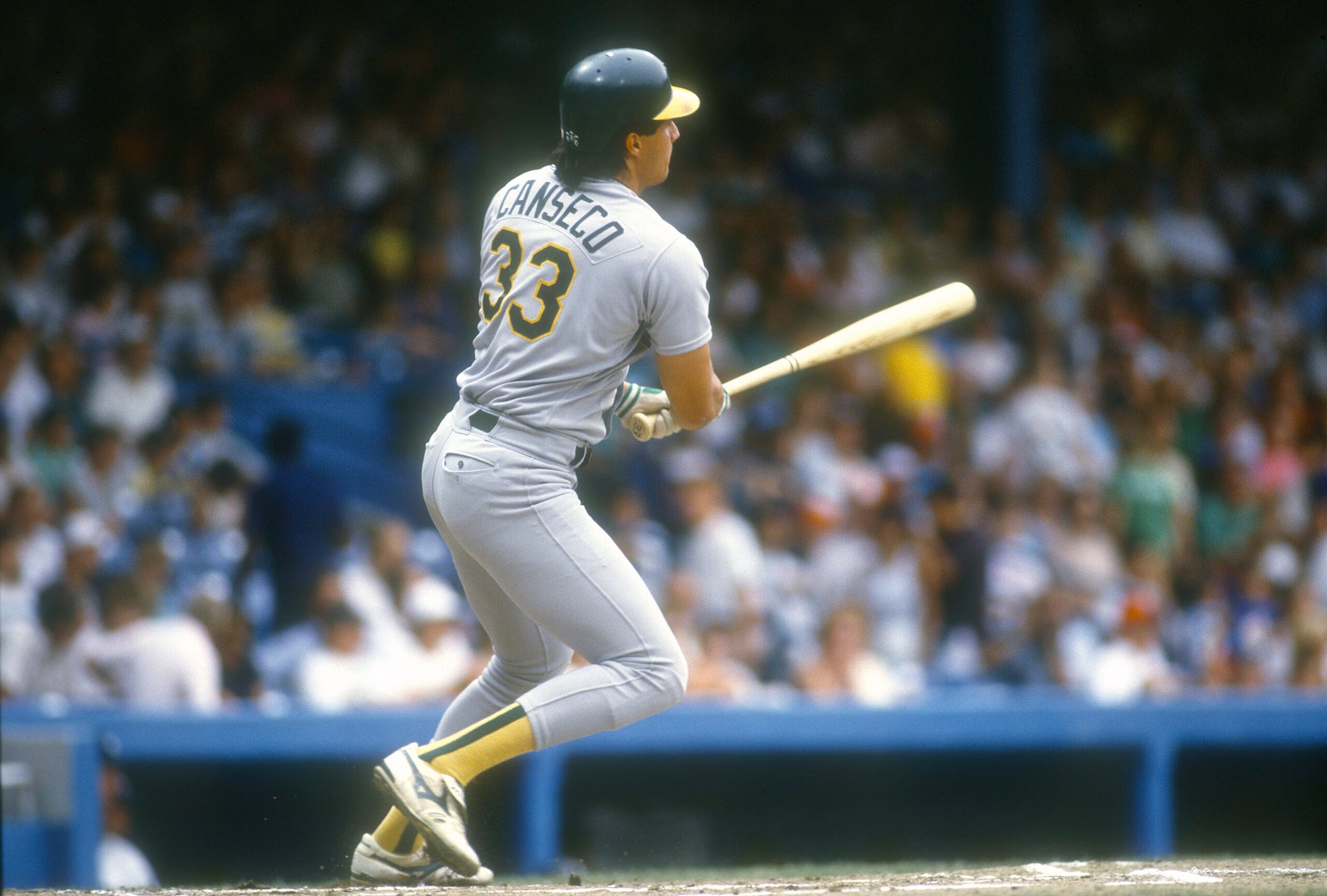 Jose Canseco takes a big swing at Tiger Stadium in Detroit circa 1990. 