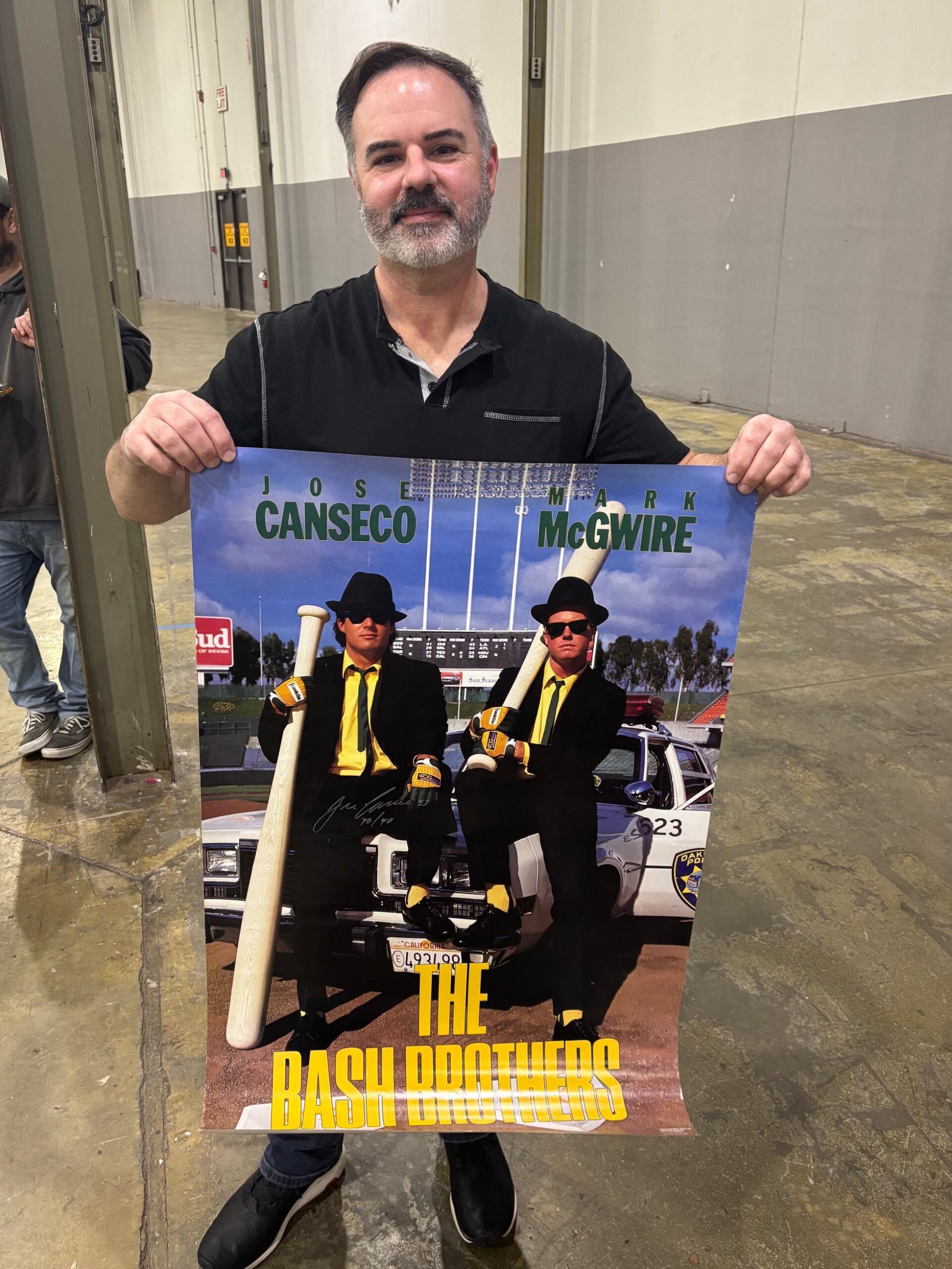 Collector Kevin Knowles got his Bash Brothers poster signed by Jose Canseco at The Charlotte Card Show. 