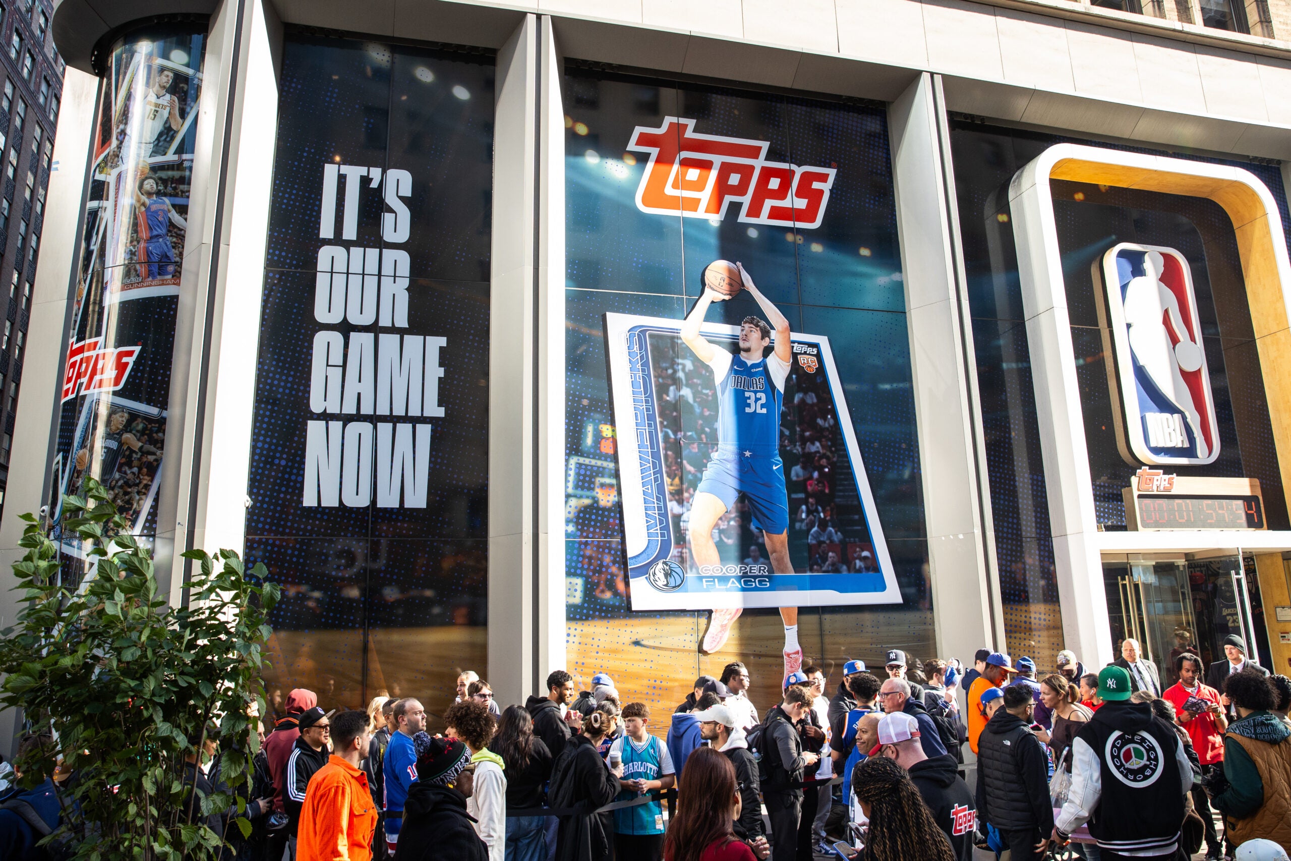 Fans stood in line for hours at the NBA store in NYC for the Topps Basketball launch party. 