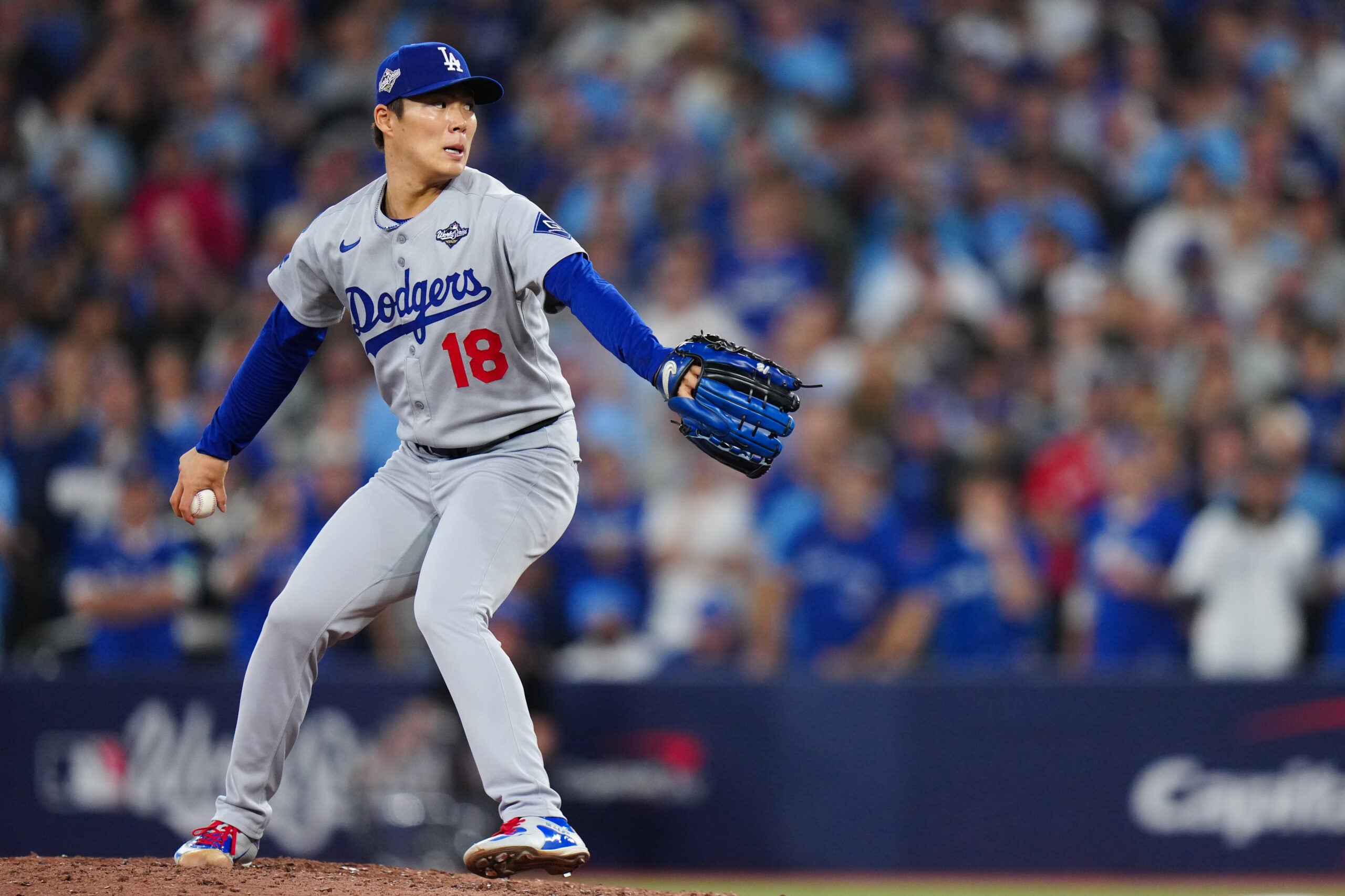 Yoshinobu Yamamoto pitches in Game 7 of the World Series. 