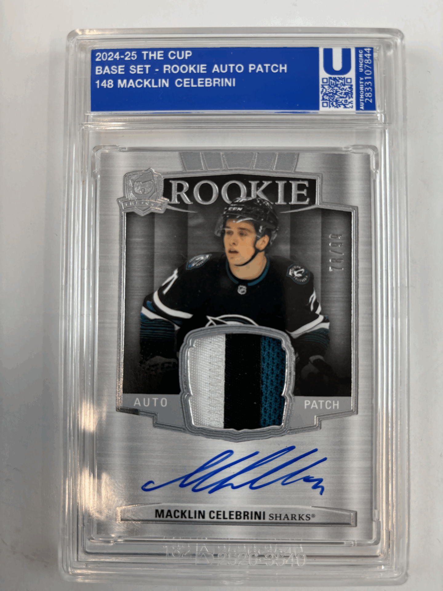 2024-25 Upper Deck The Cup Macklin Celebrini Rookie Patch Auto card with The Authority Grading Chip.