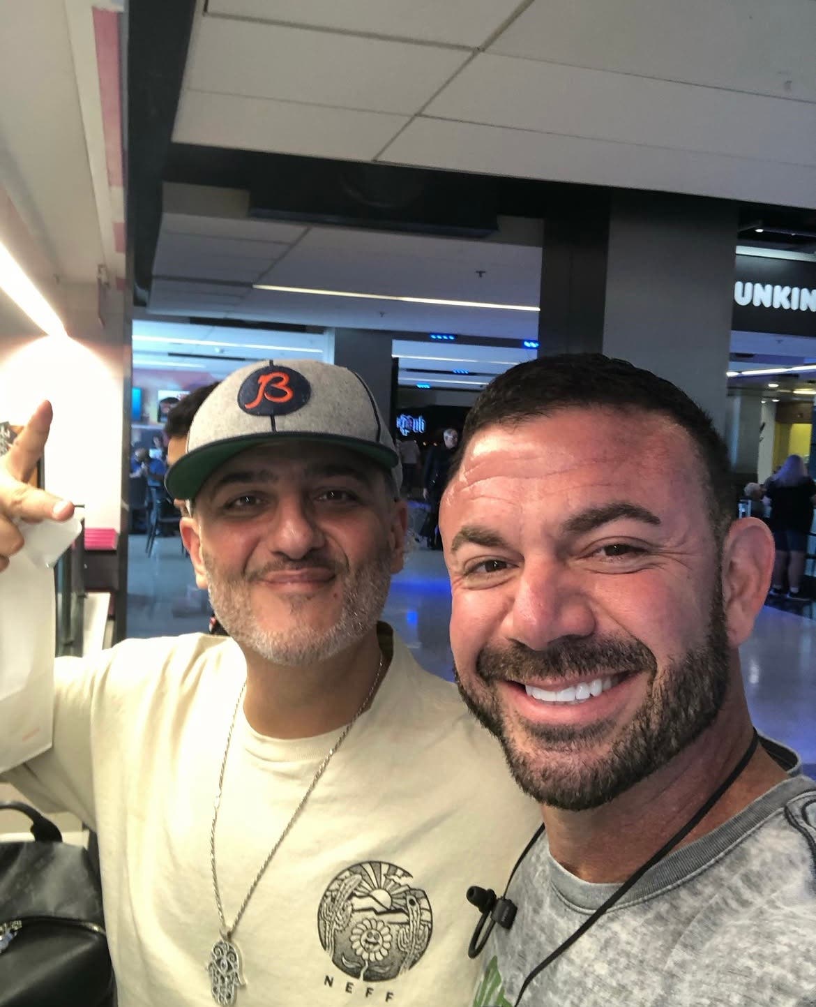 Sports card dealer Erik Myers with fellow collector Naz Nubzz at the 2024 National in Cleveland.