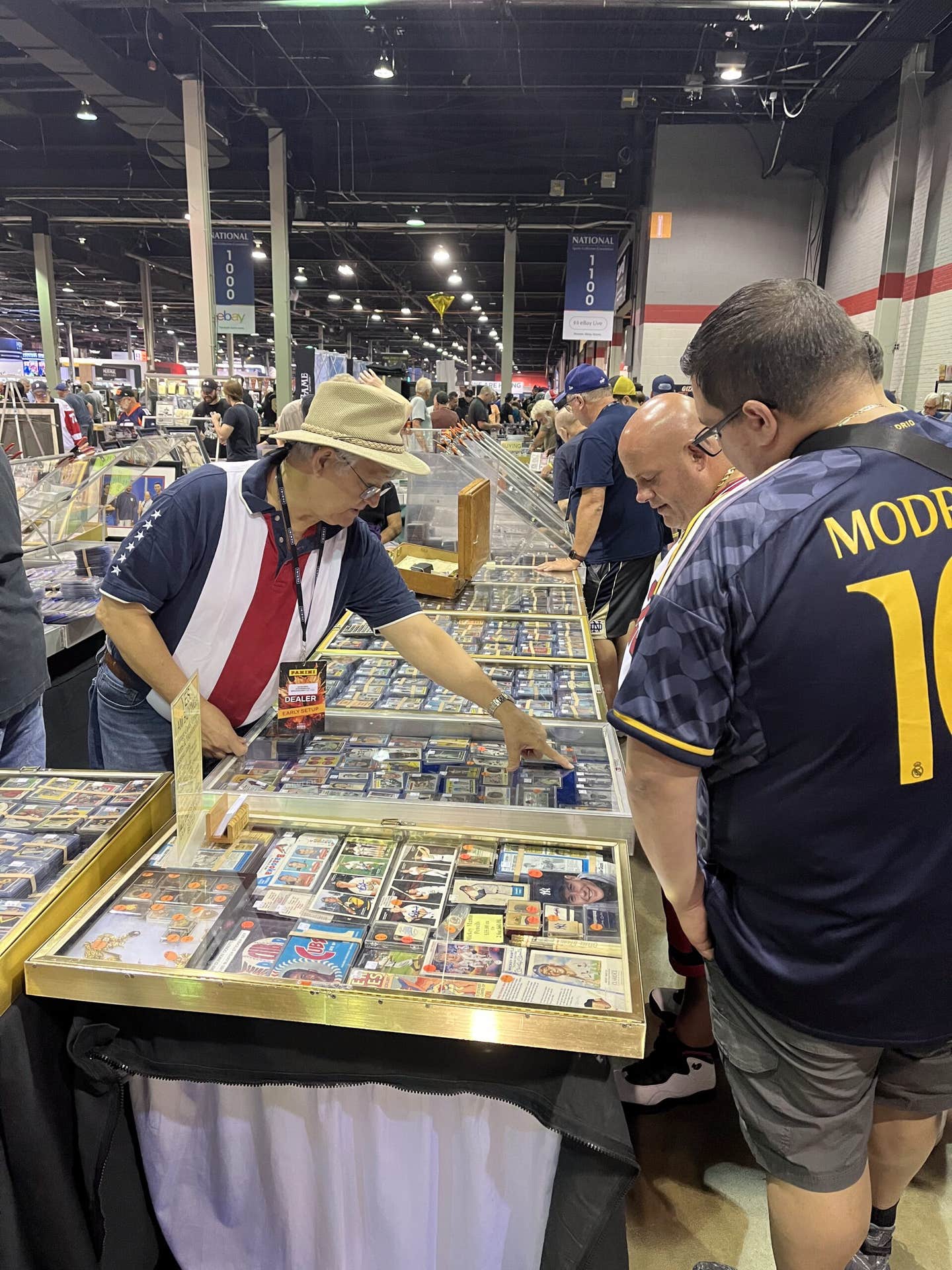 Collectors shop for cards at the National Sports Collectors Convention.