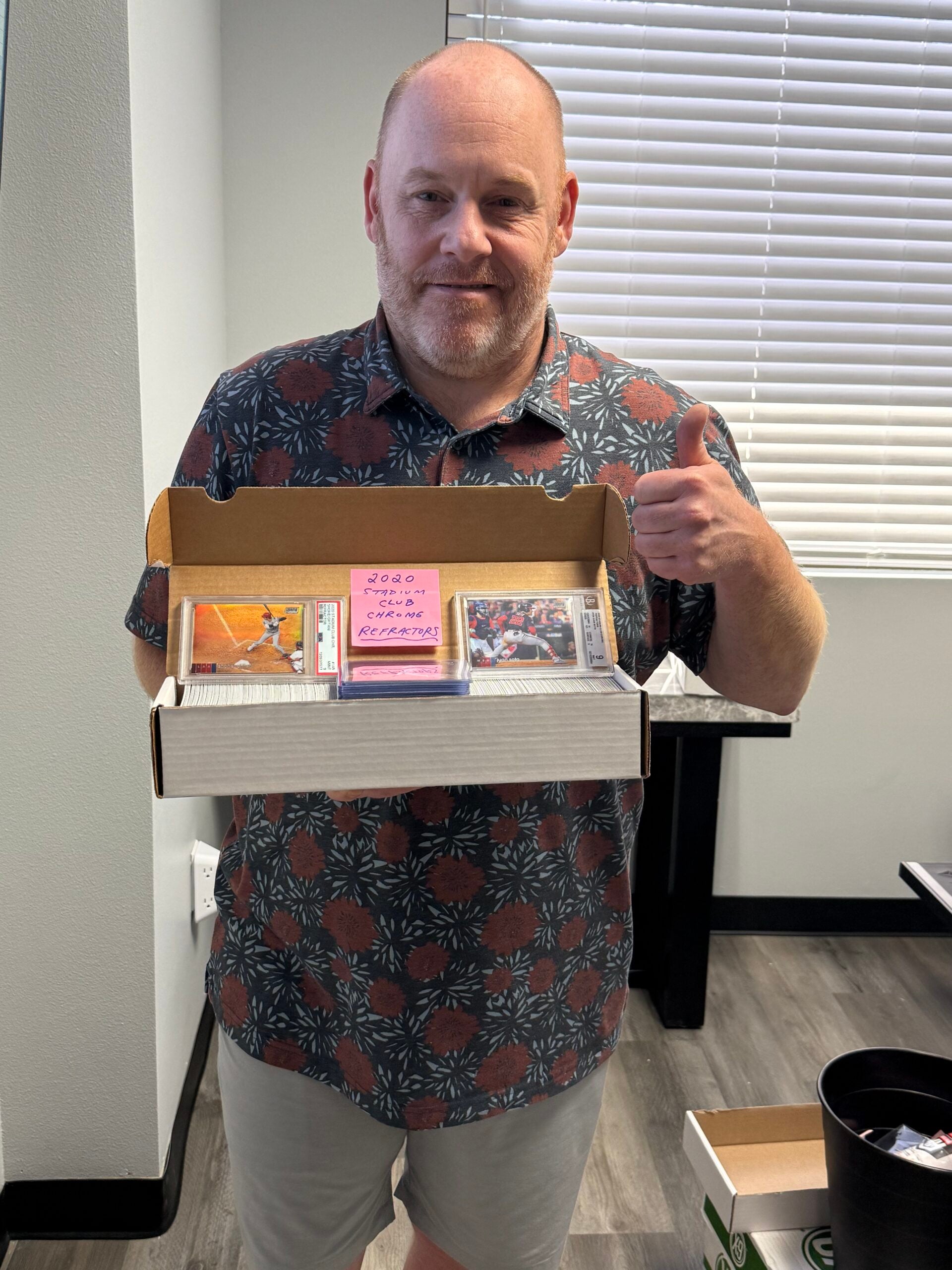 Collector Scott Reinold with his 2020 Topps Stadium Club Chrome Refractors set. 