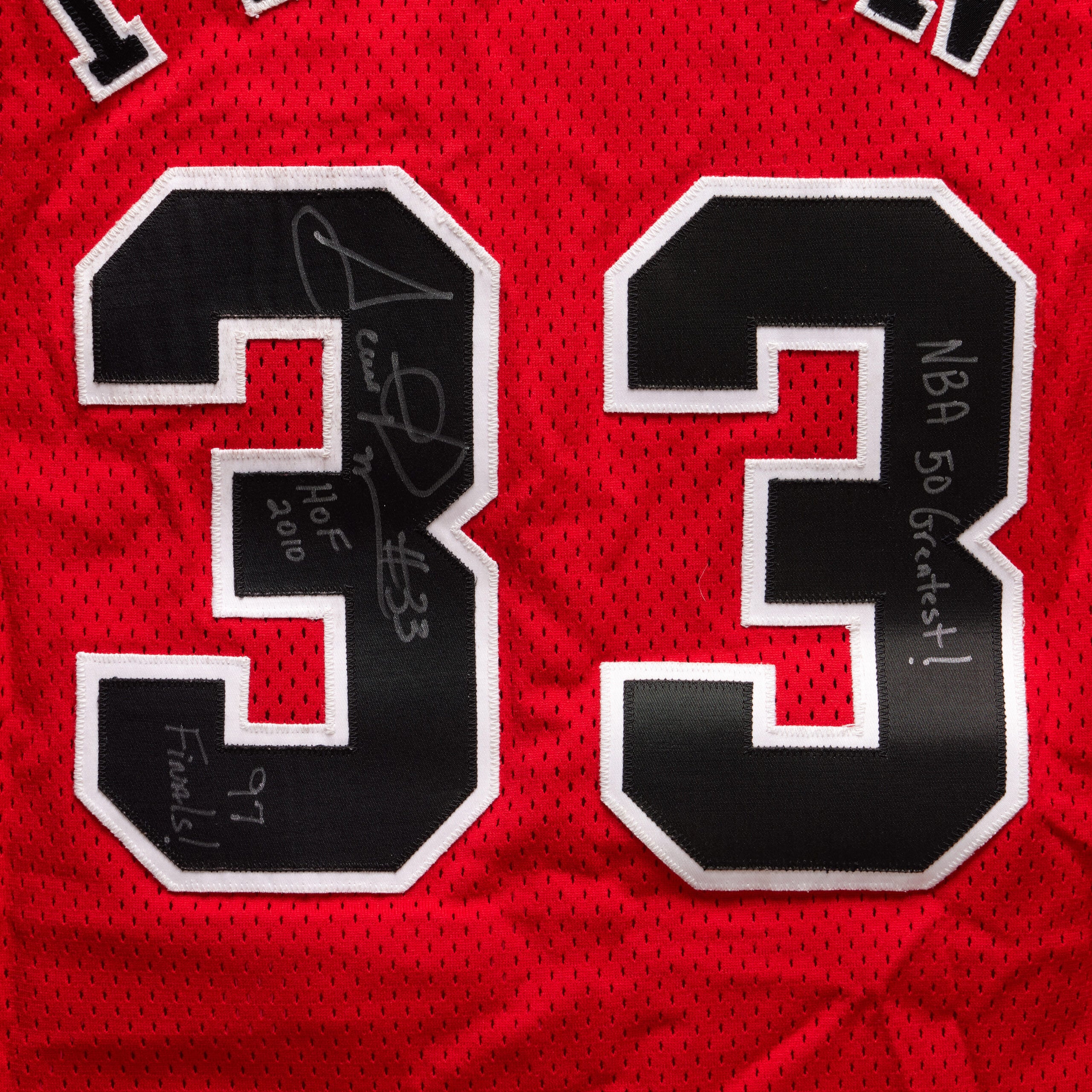 Scottie Pippen Collection with NBA championship jerseys, trophies