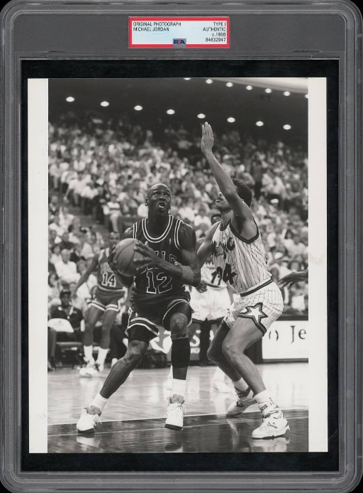 1990-michael-jordan-12-type-i-original-photo---one-of-only-three-certified-type-is-from-mj-wearing-12-jersey-in-infamous-valentines-day-game-after-23-jersey-theft---only-time-in-entire-career-he-wore-.png
