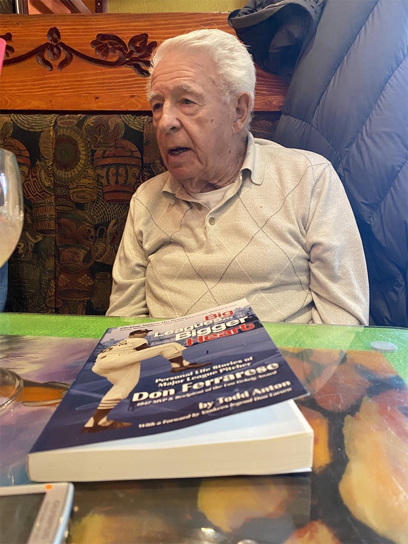 don-ferrarese-with-his-autobiography-in-foreground.jpg